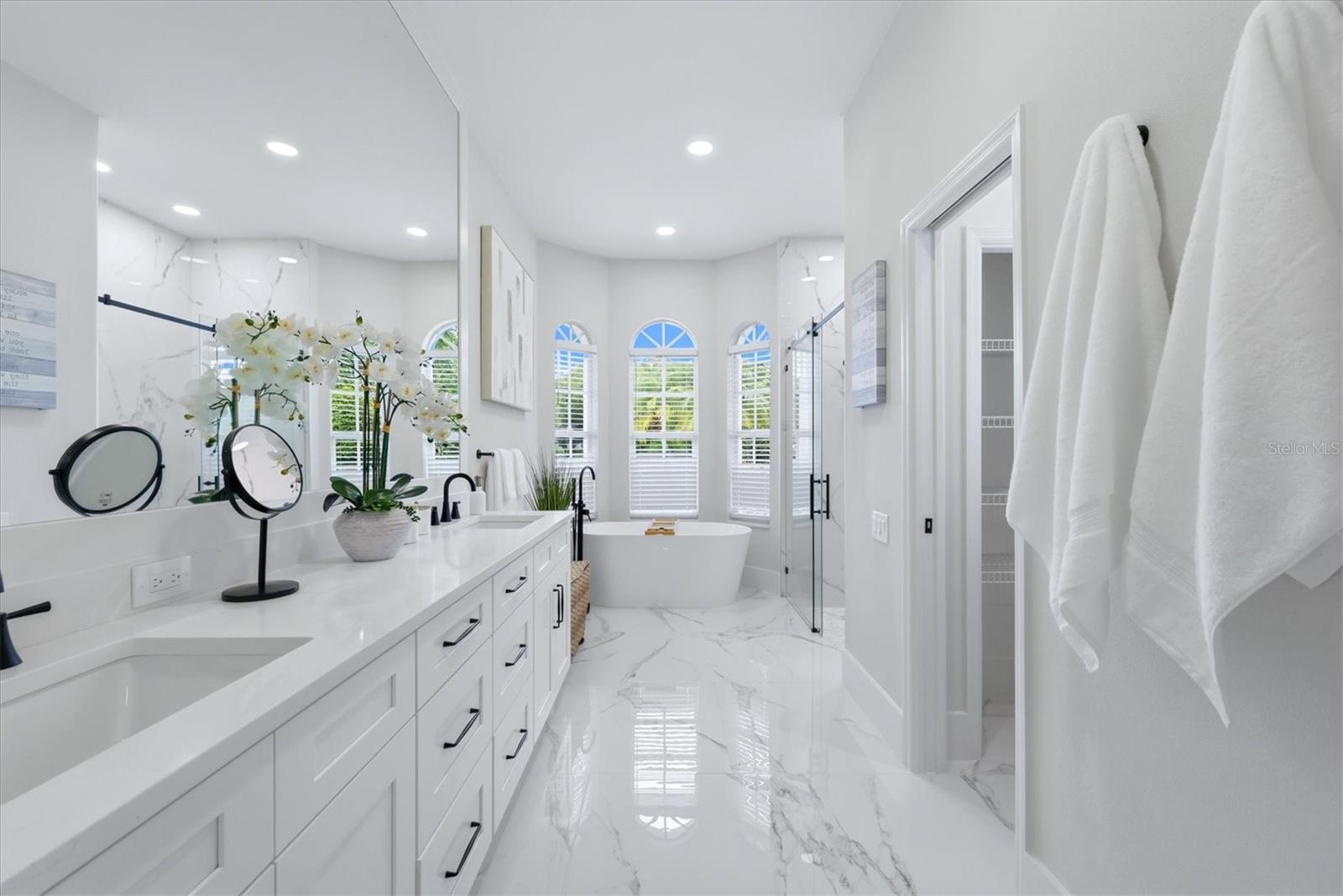 Primary Bathroom with freestanding Tub, Vanity with Dual Sinks - 7825 WILTON CRESCENT CIR, BRADENTON