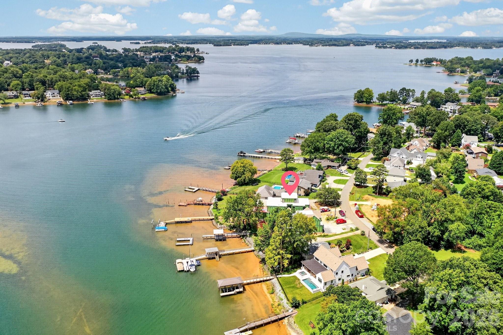 Aerial view facing west on Lake Norman. You can tell the third story terrace has amazing views in all directions. - 21506 Rio Oro Drive, Cornelius