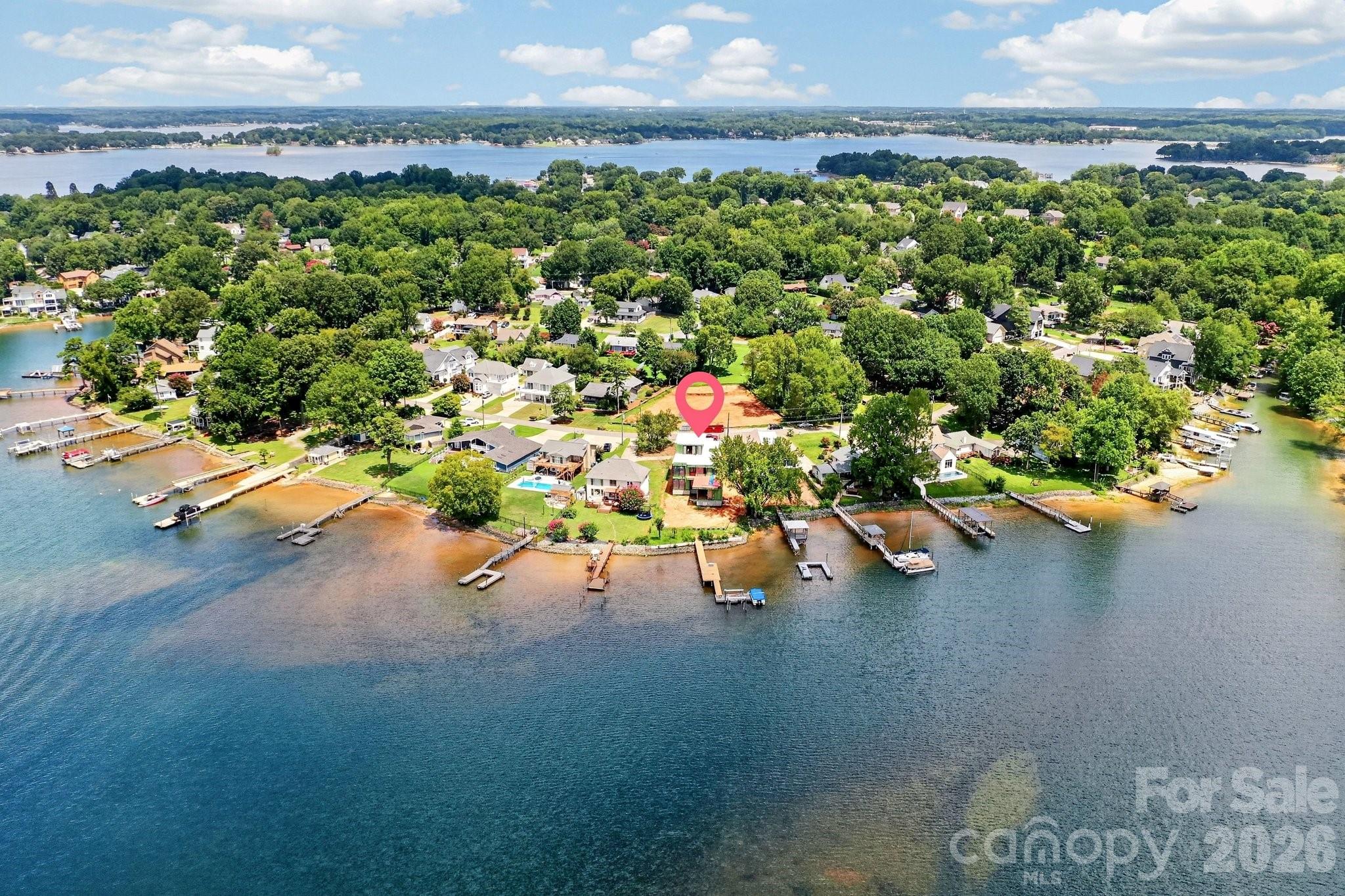Aerial view looking north. Water surrounds this amazing home and location. - 21506 Rio Oro Drive, Cornelius