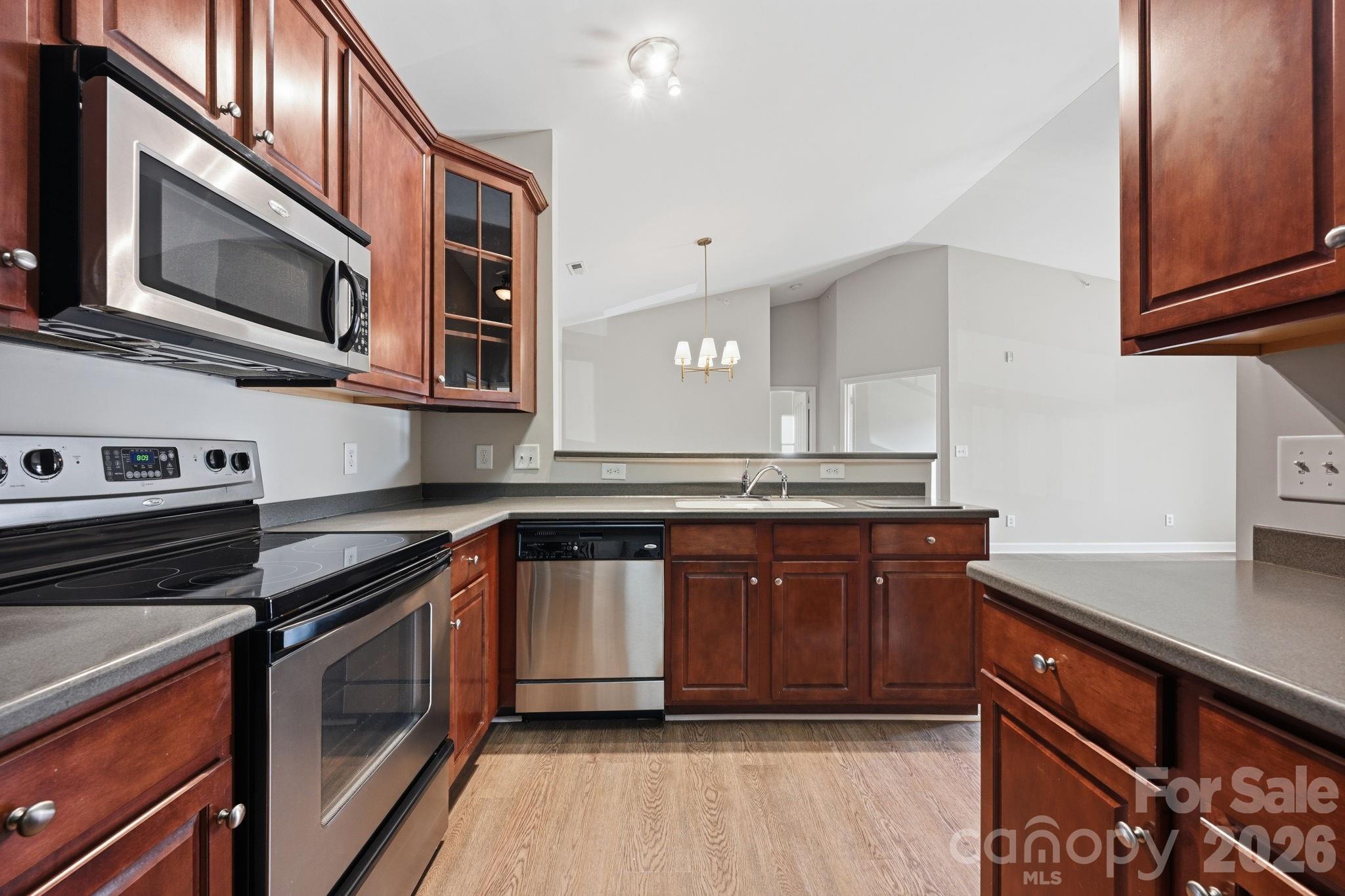 Dish washer and great pass through to dining area - 16648 E Amberside Road, Cornelius