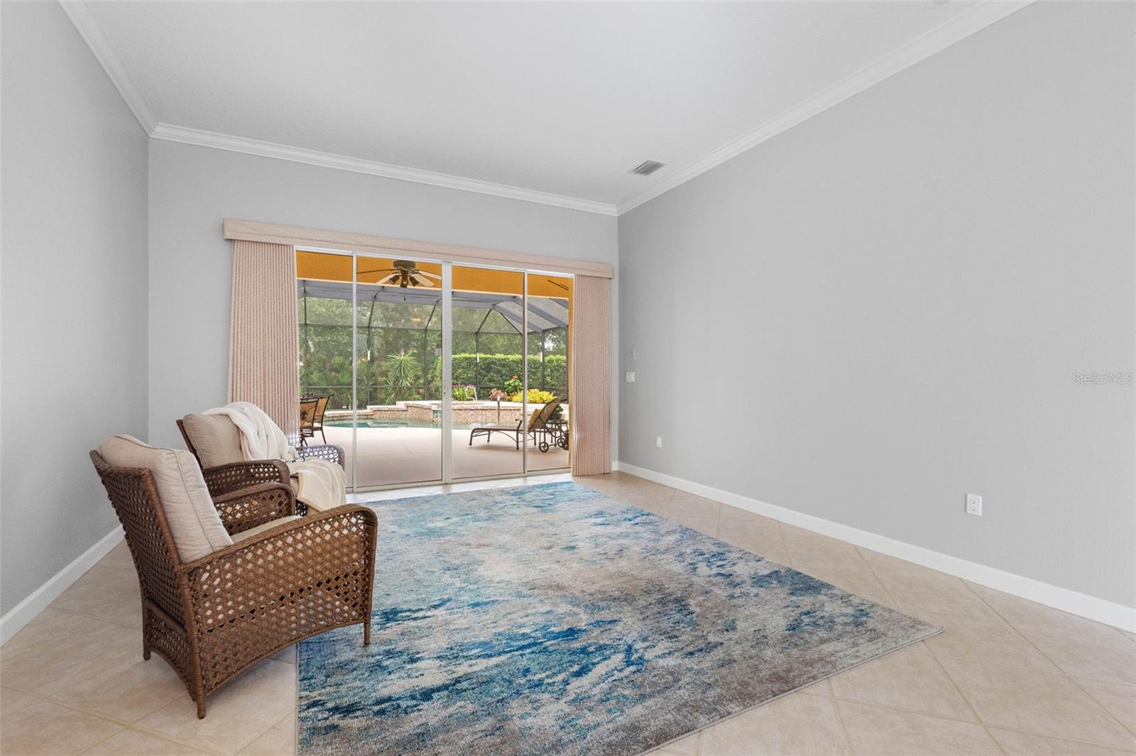 View of Pool area from Formal Living Room - 6803 COYOTE RIDGE CT, BRADENTON