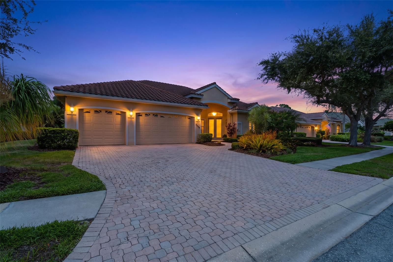 Evening front view - 6803 COYOTE RIDGE CT, BRADENTON