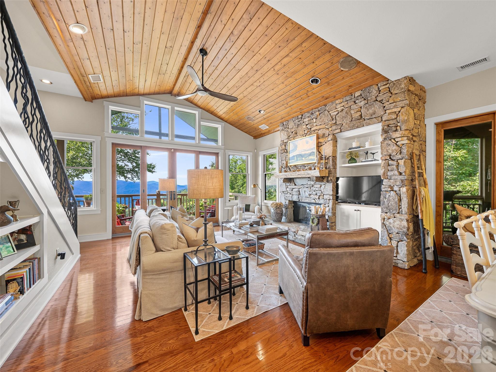 Hardwood floors and wall of windows - 530 Andrew Banks Road, Burnsville