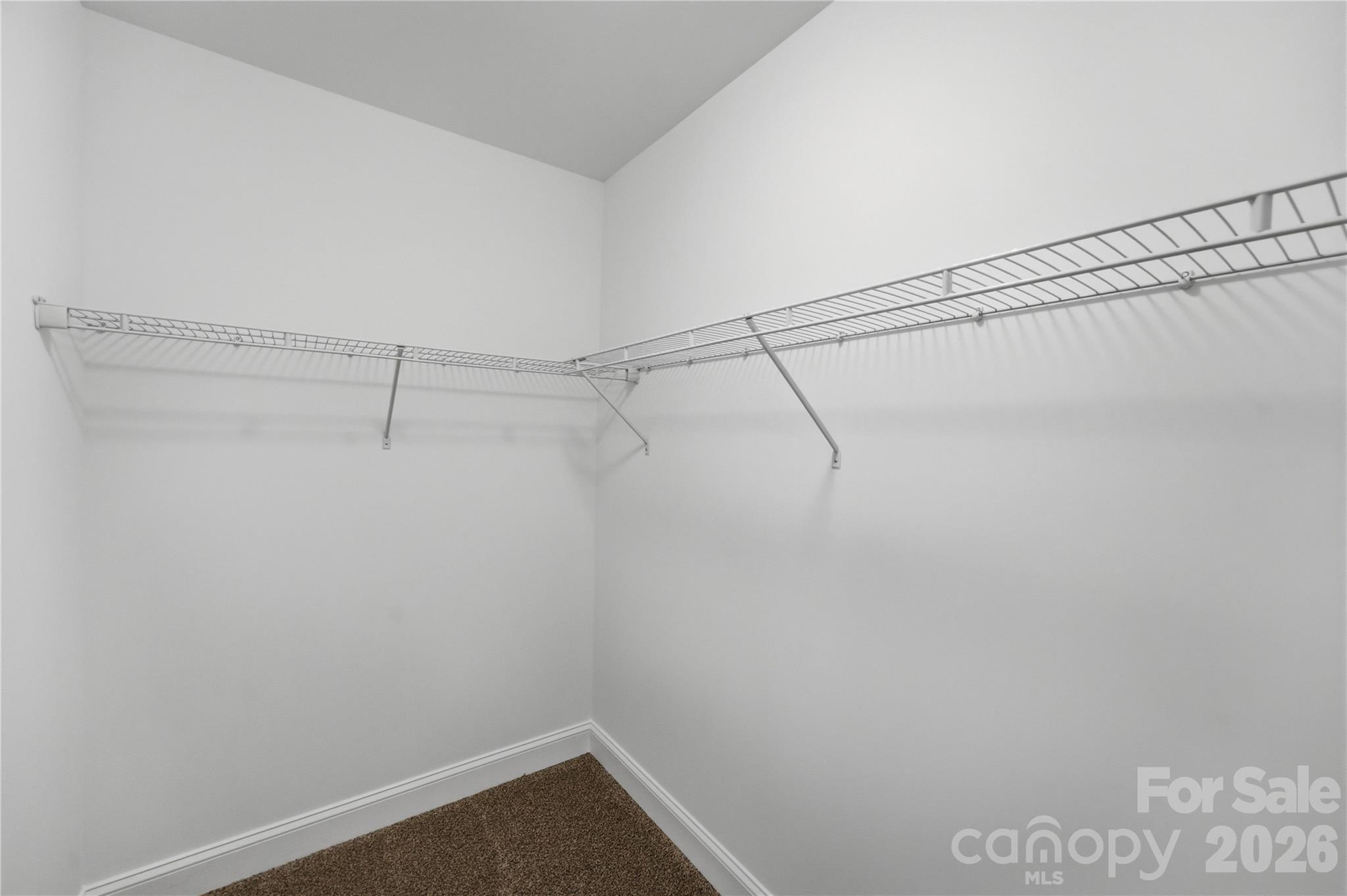 Walk-in closet in ssecondary bedroom 1 - 14133 Woodhurst Lane, Mint Hill