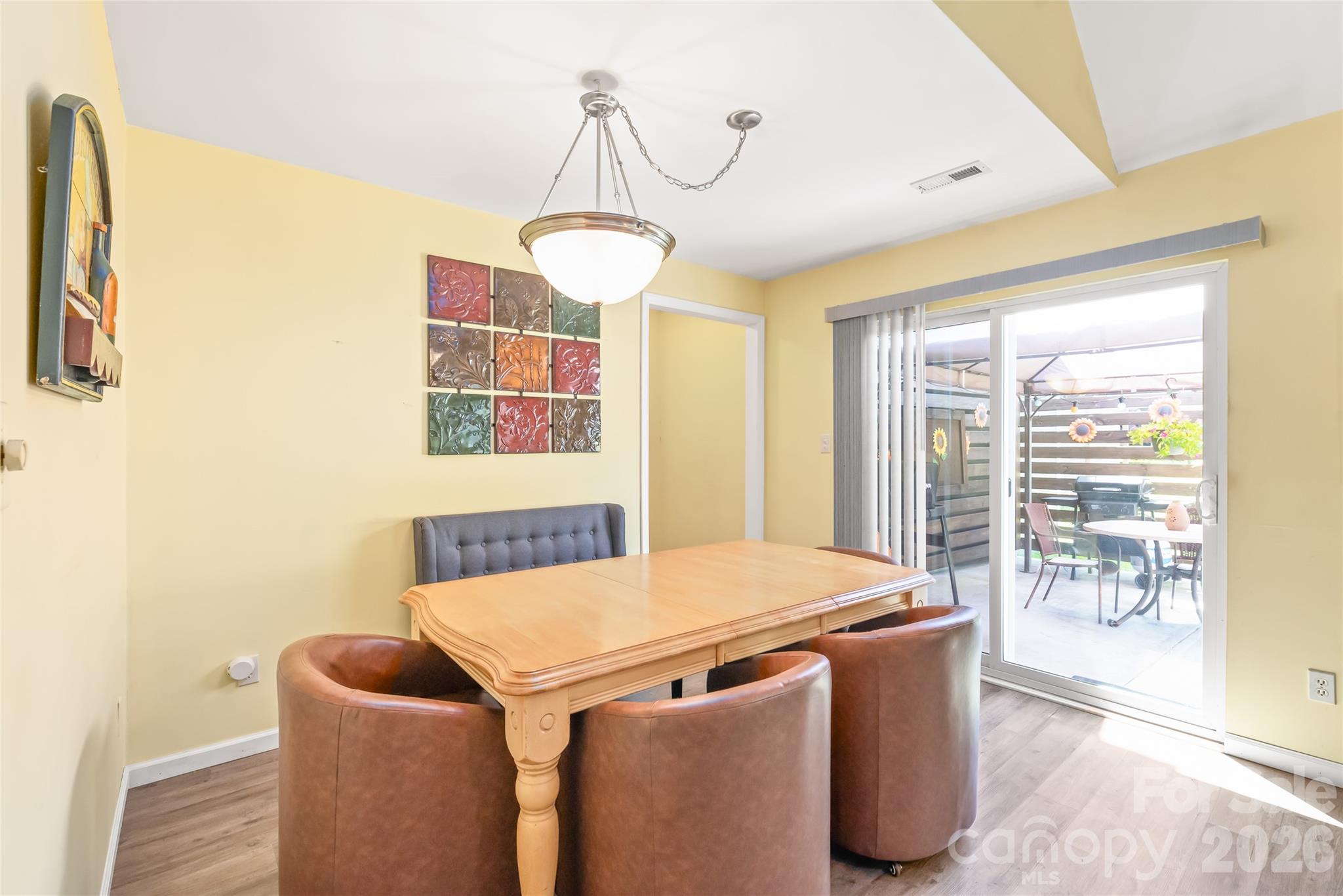 Sliding doors lead to back patio and large back yard - 2241 Indian Cross Trail, Matthews