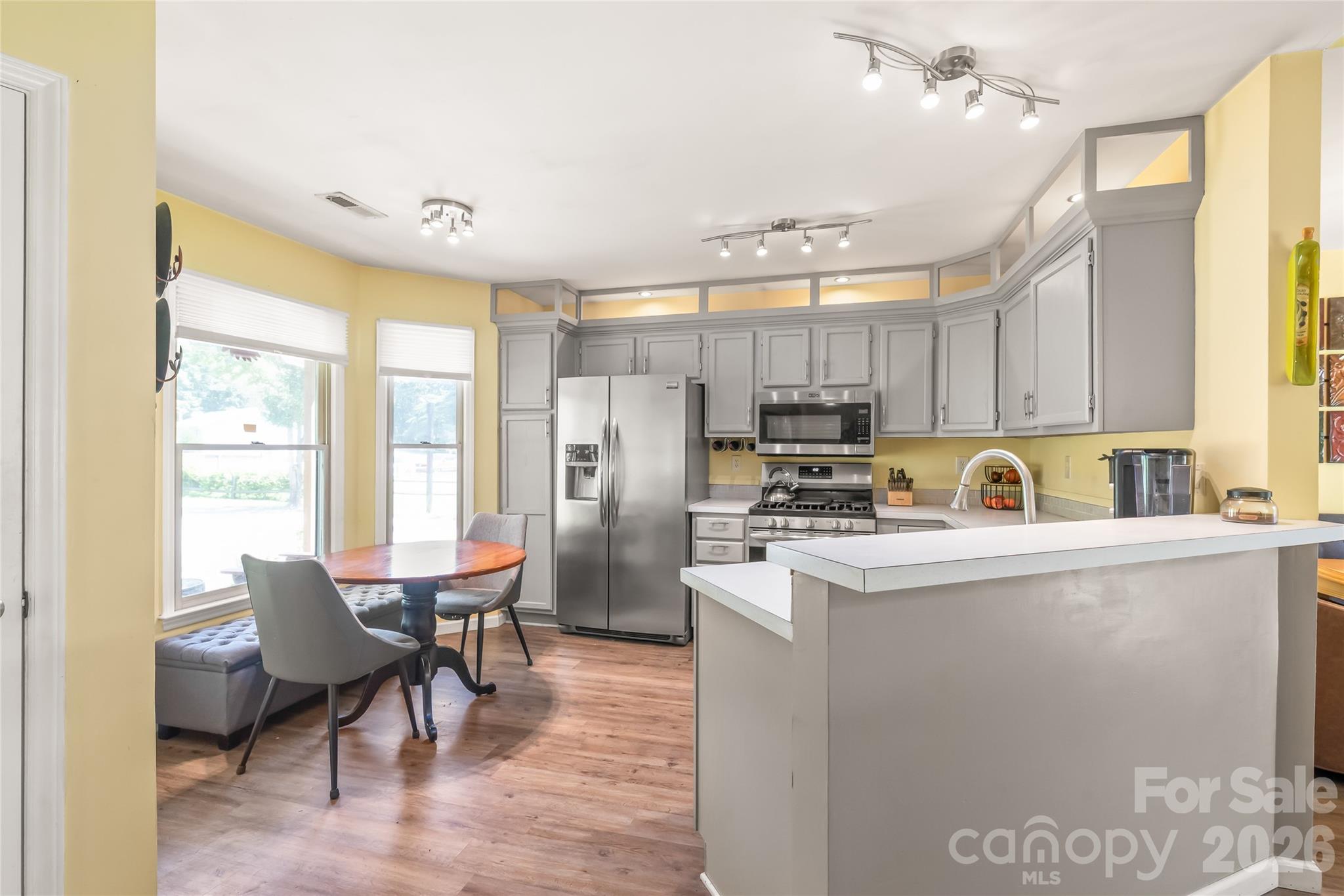 Eat in breakfast area with bay window over looking front porch and yard - 2241 Indian Cross Trail, Matthews