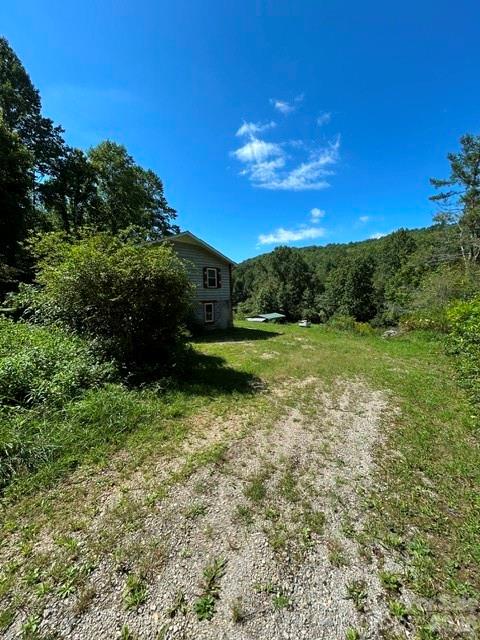 side of the house - 107 Flat Creek Drive, Lake Toxaway