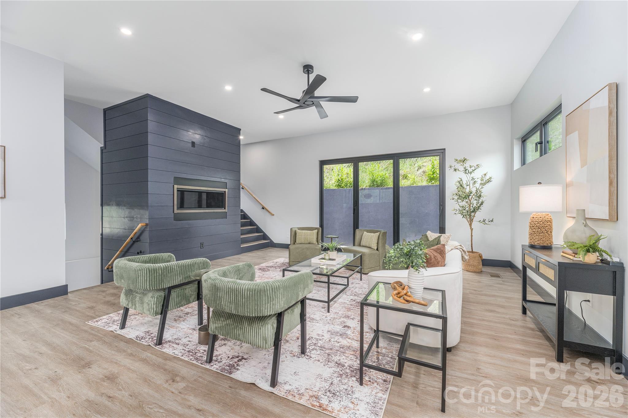 Living room with modern gas fireplace - 19 Woodbine Road, Asheville