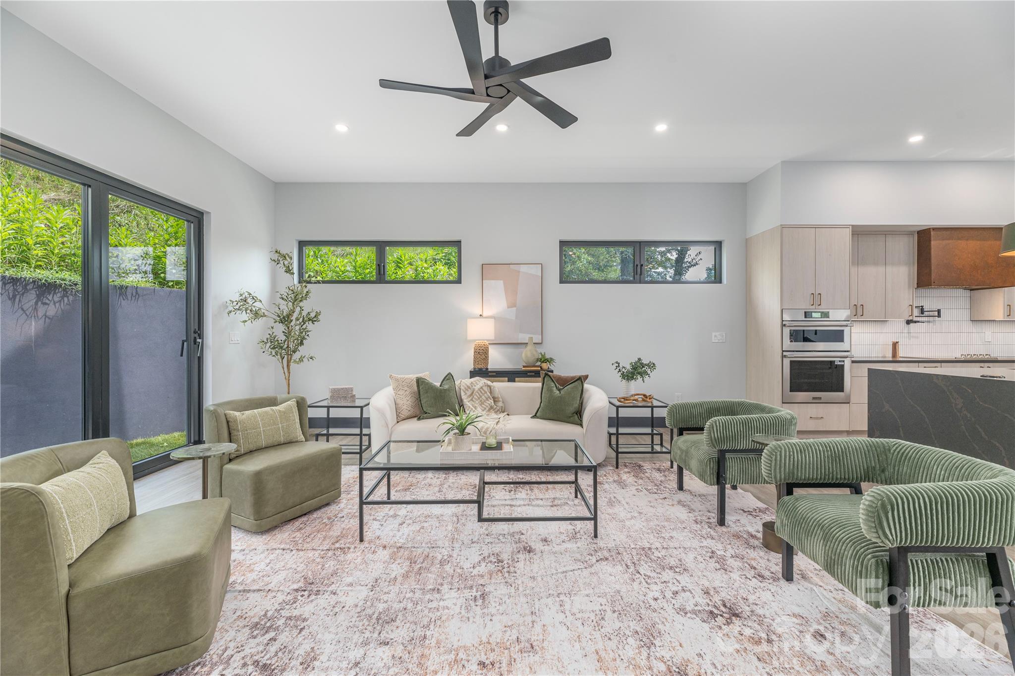 Large living room is open to the dining and kitchen - 19 Woodbine Road, Asheville