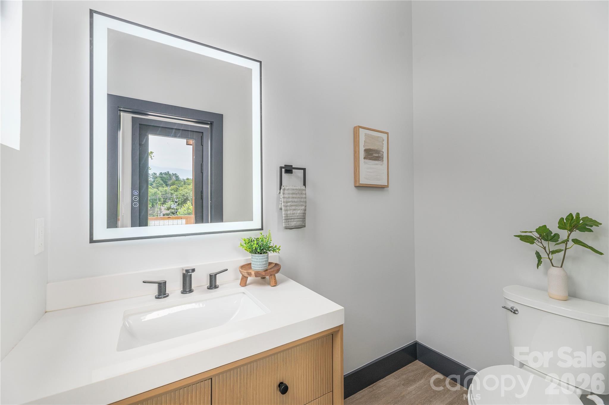 Half bath on main living level - 19 Woodbine Road, Asheville