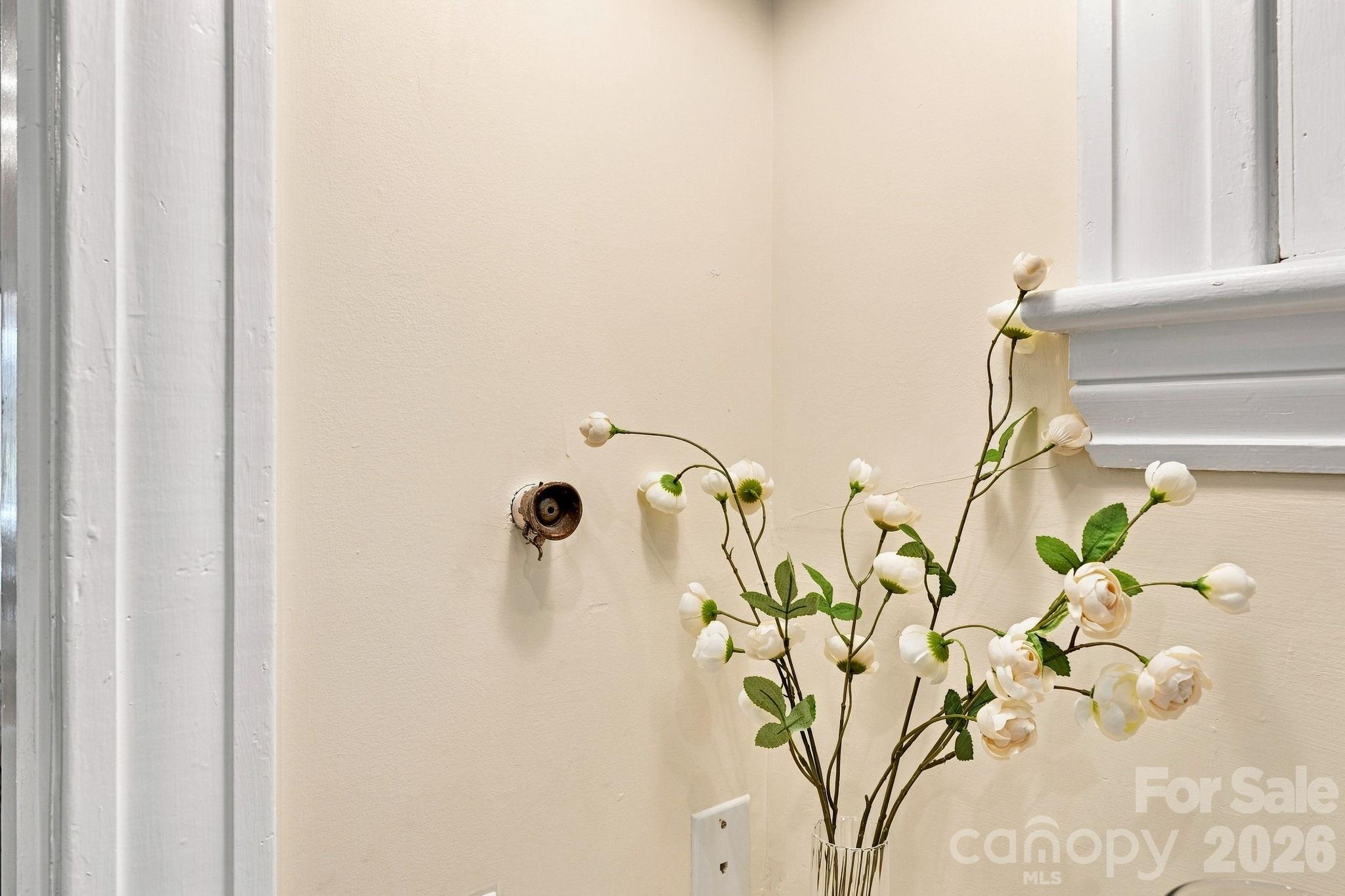 Original speaking tube from kitchen to primary bedroom - 559 N Main Street, Davidson