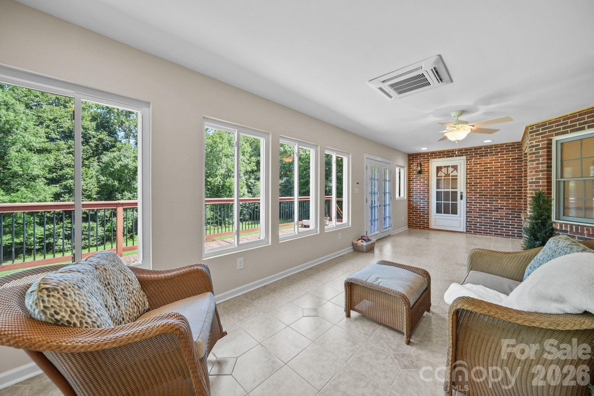 Four season sunroom with interior and exterior entries. Also accessible from primary bedroom. - 3008 Eaker Drive, Cherryville