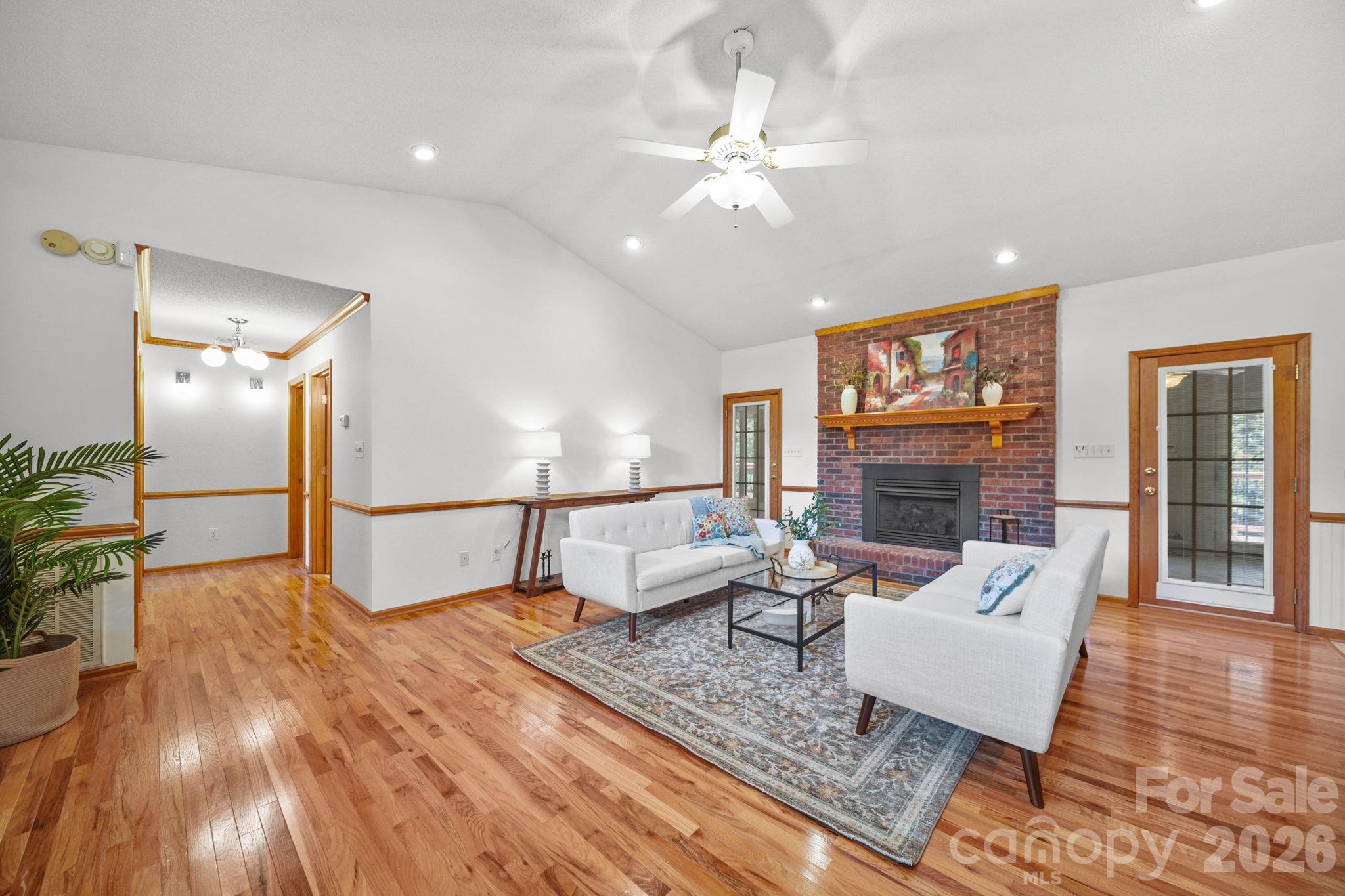 To the left are two additional bedrooms, a large hall closet, and a bathroom with dual vanities. - 3008 Eaker Drive, Cherryville