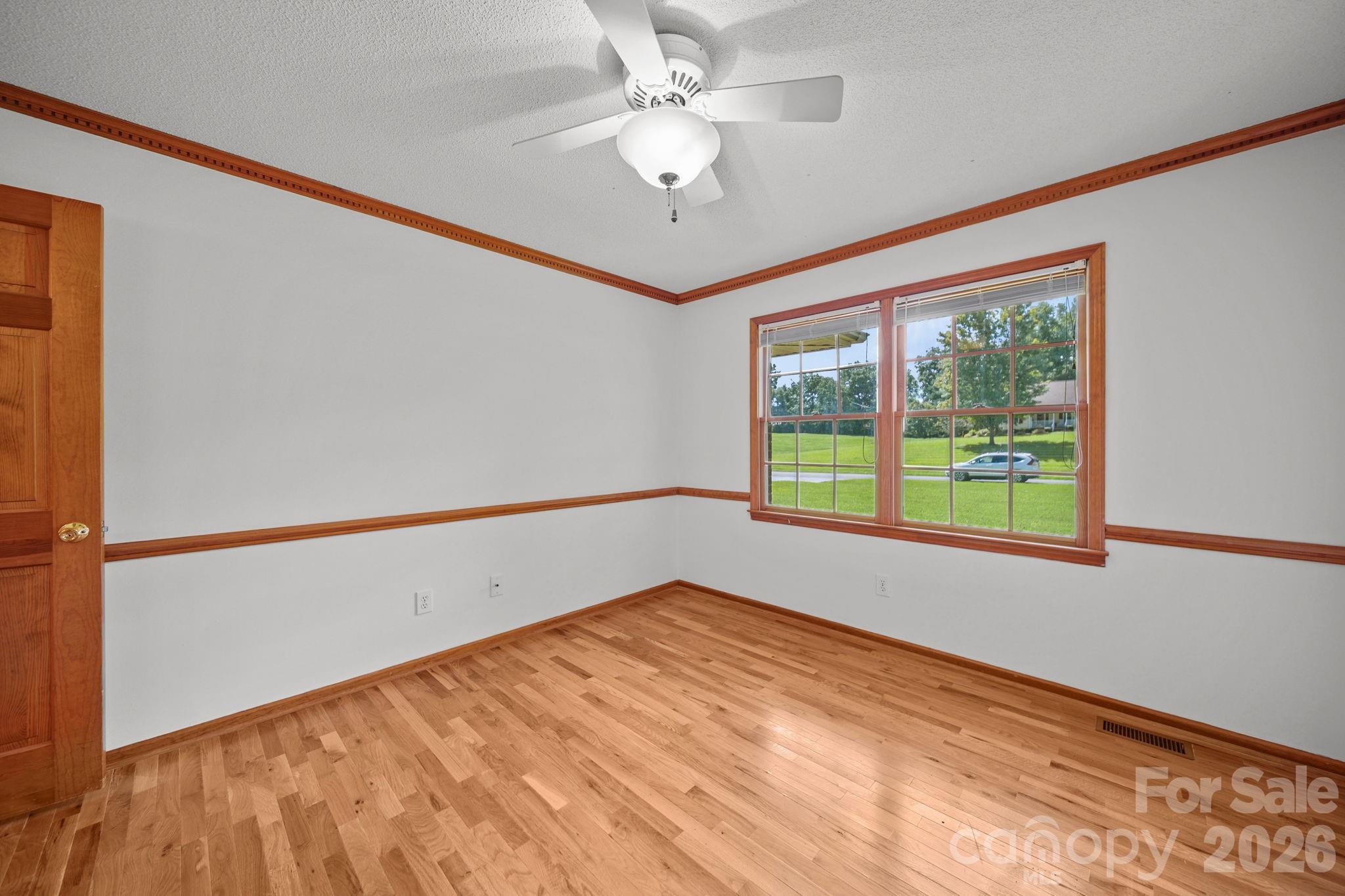 Freshly painted bedroom facing the front yard. - 3008 Eaker Drive, Cherryville