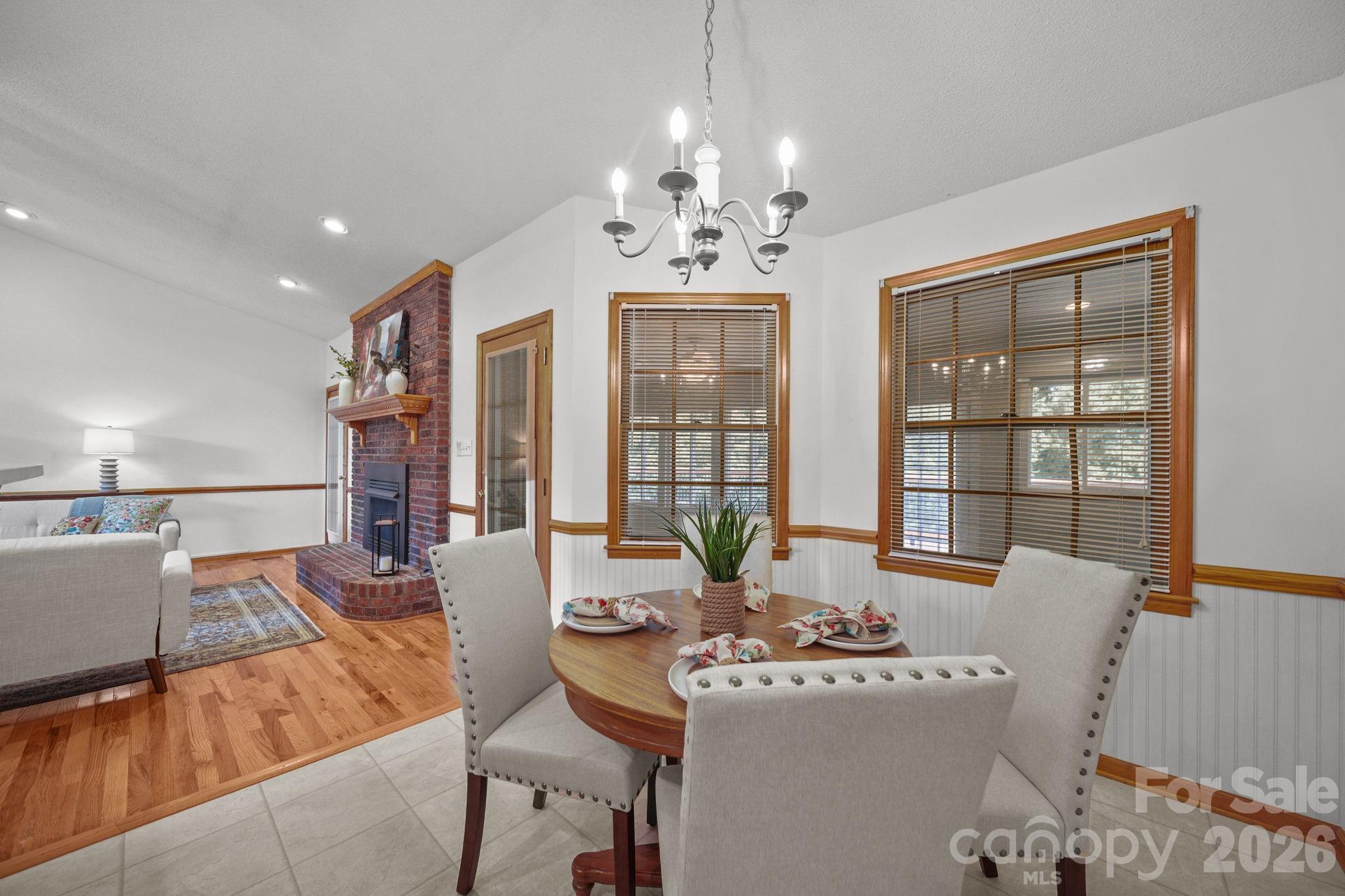 Enjoy informal meals in this cozy area while still being part of the conversation in the family room. - 3008 Eaker Drive, Cherryville