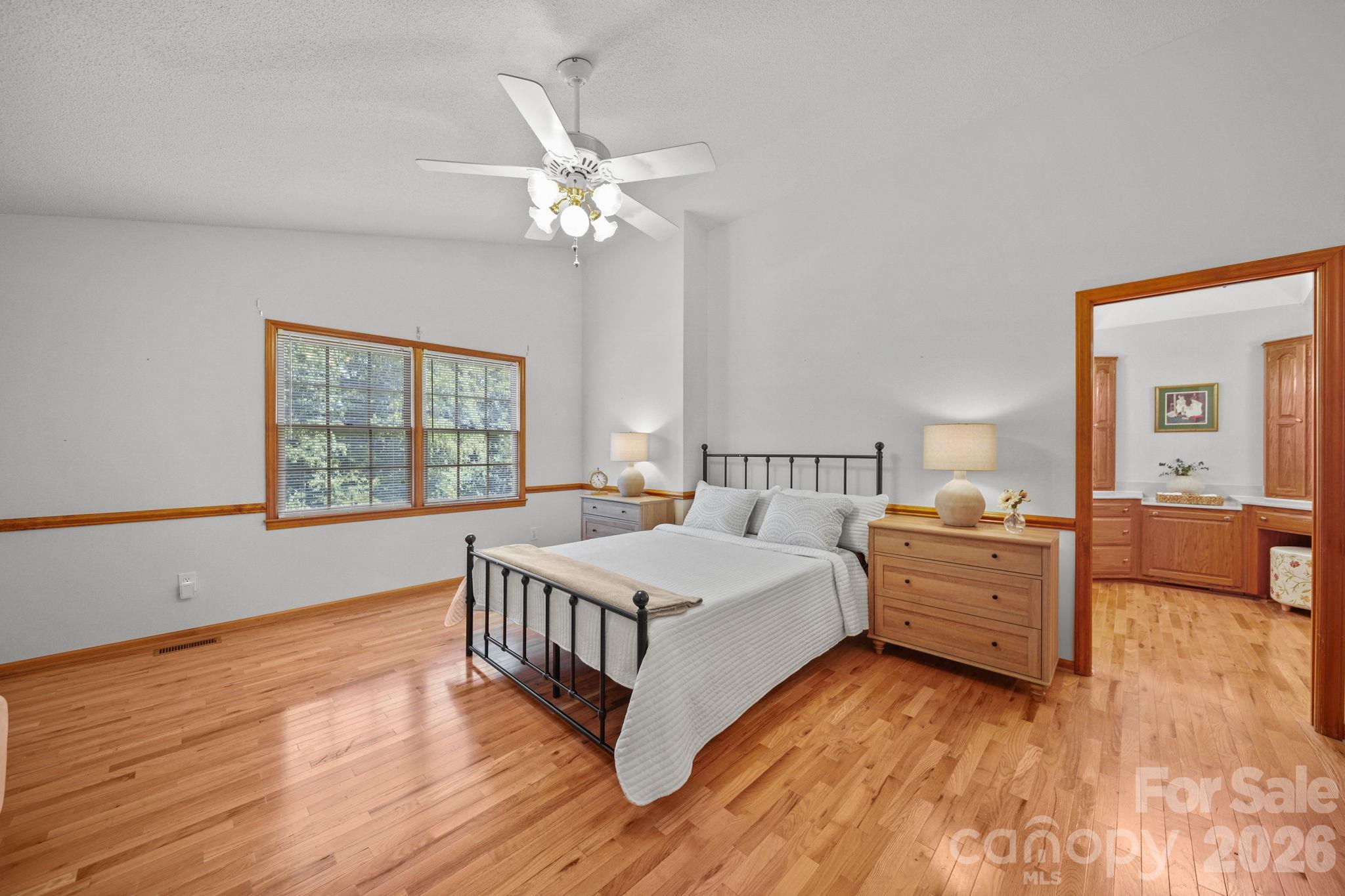The primary suite includes a large bedroom, bathroom, and walk-in closet. - 3008 Eaker Drive, Cherryville