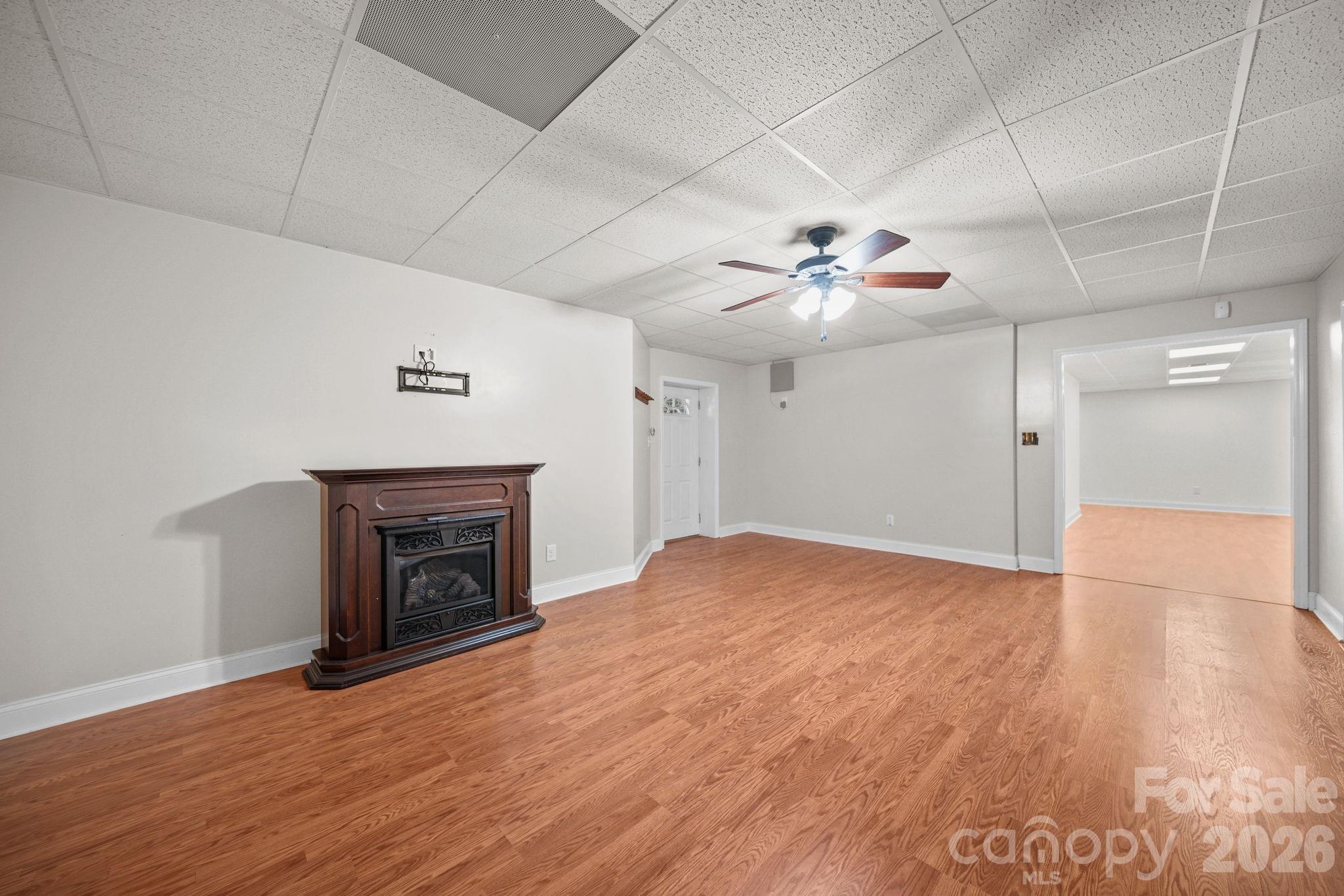 This space would be a perfect movie room, gym, or second hangout. From this space, you can access the screened porch. - 3008 Eaker Drive, Cherryville