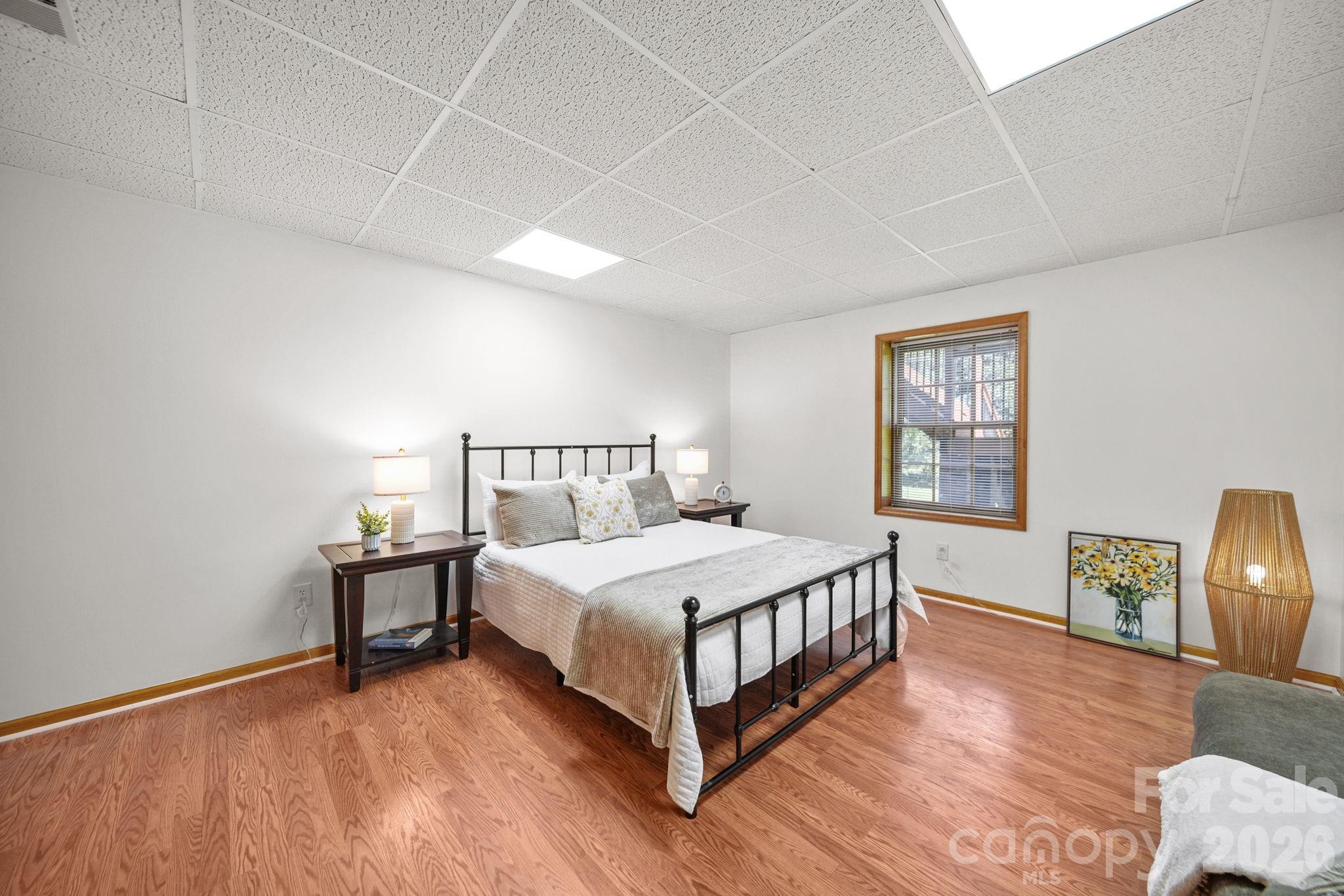 Large downstairs bedroom with built-ins and walk-in closet. - 3008 Eaker Drive, Cherryville