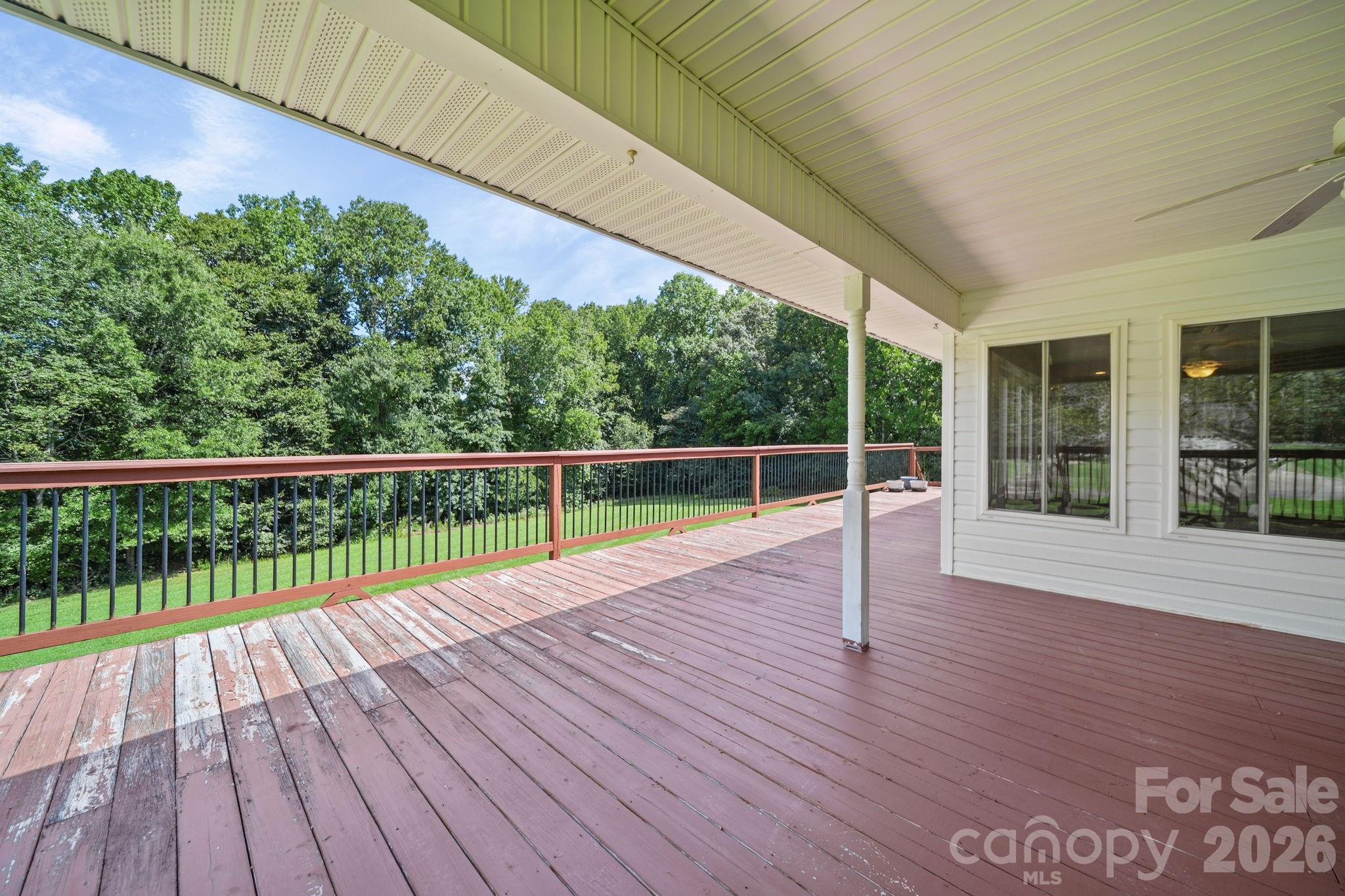 Main floor deck with a portion of the deck covered. So much outdoor entertaining space! - 3008 Eaker Drive, Cherryville