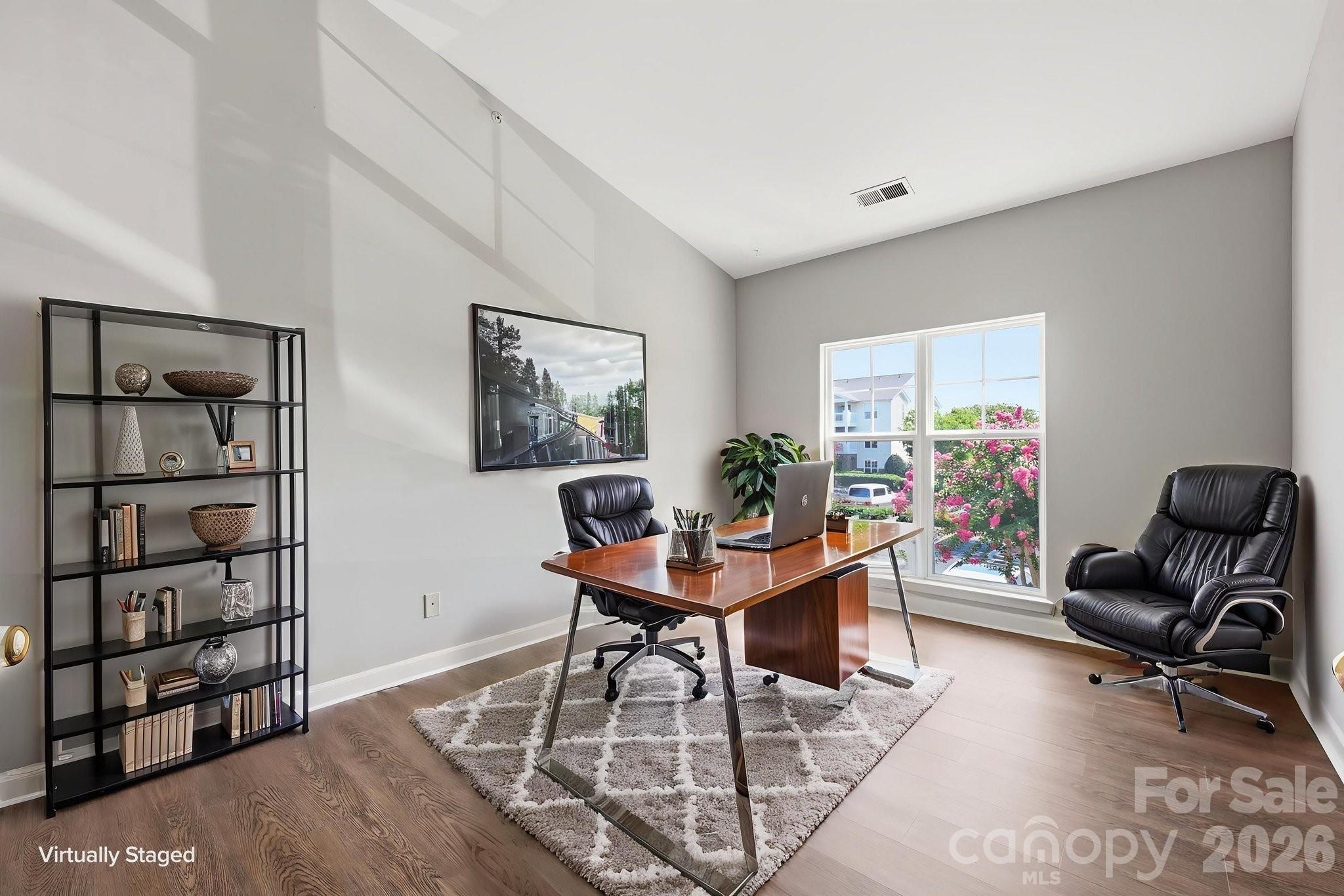 Flex room has vaulted ceiling, huge window and wood paned double French doors. Being shown as an office but can be childrens playroom, workout room or whatever your family needs. - 16648 E Amberside Road, Cornelius