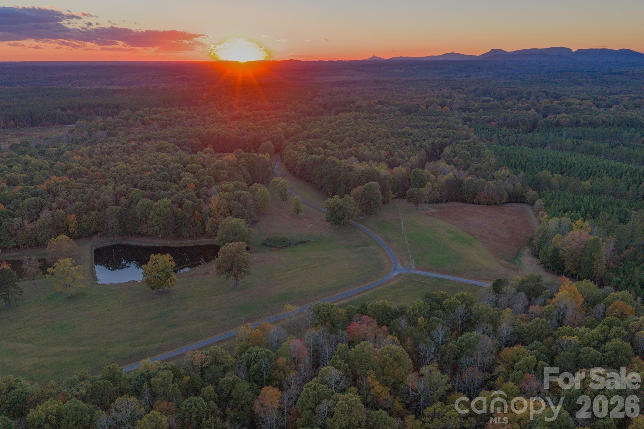 3 stocked fishing ponds, open pasture land, and wooded areas - 1260 Beaver Island Trail Road, Walnut Cove