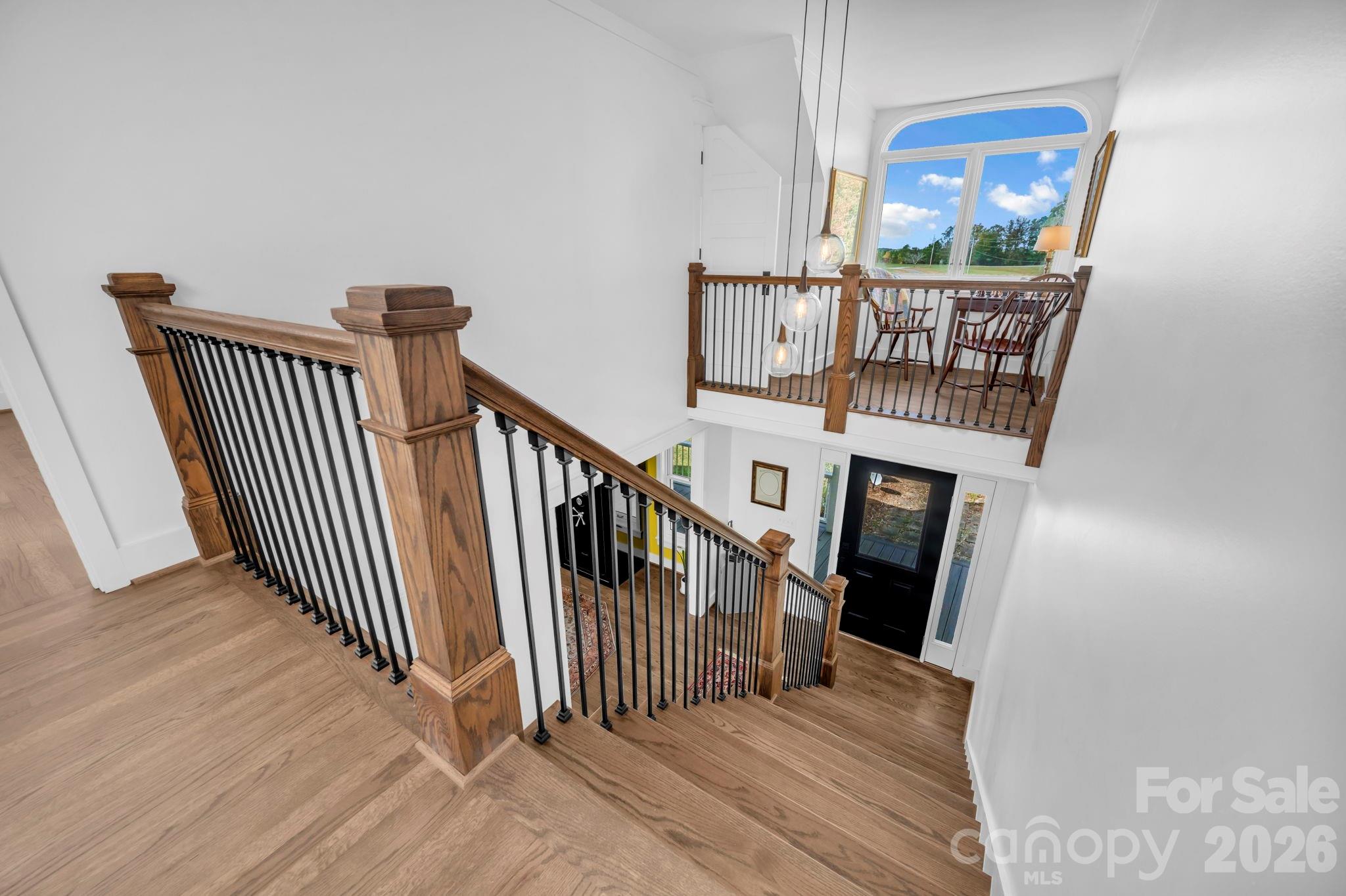 2 story foyer with decorative glass ball light fixtures - 1260 Beaver Island Trail Road, Walnut Cove