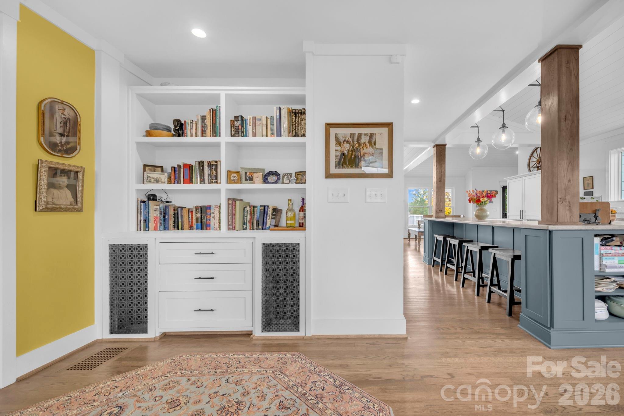 Sitting room adjacent to foyer w/ built in display shelves/bookcase and cabinet storage - 1260 Beaver Island Trail Road, Walnut Cove