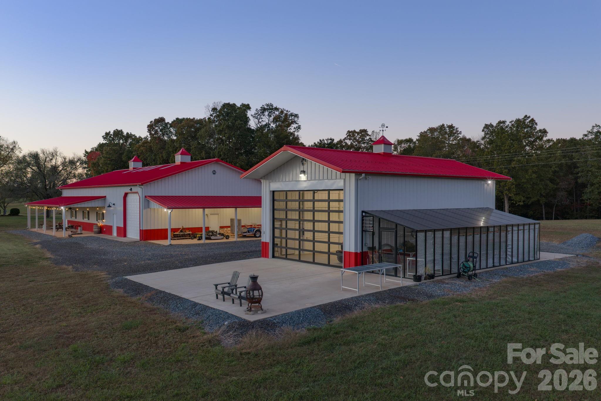 Recreational building w/ attached greenhouse, built by Morton Buildings, w/ 2 large glass garage doors, ideal for gardening/storage/ or recreational use - 1260 Beaver Island Trail Road, Walnut Cove