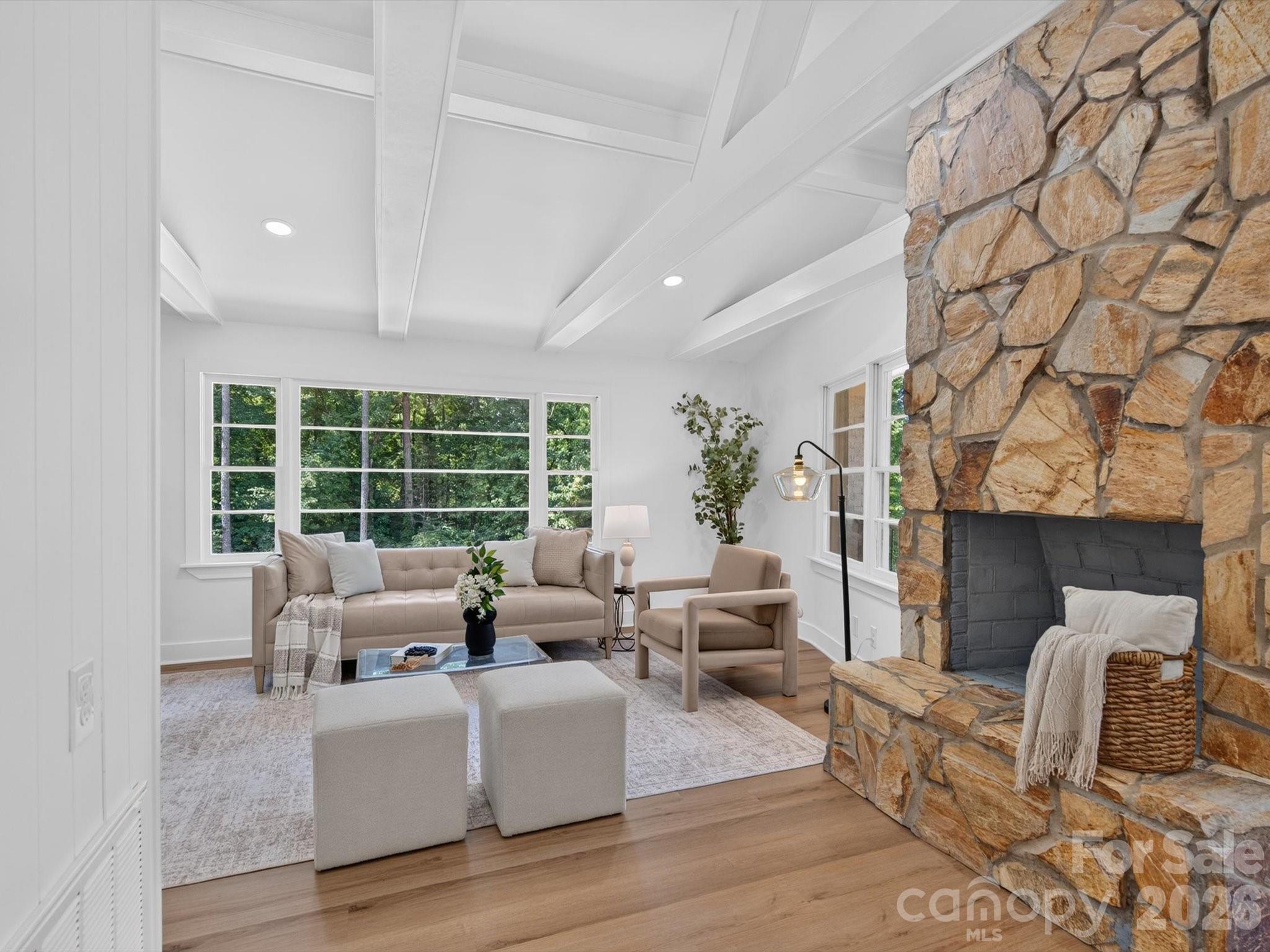 Stone fireplace steals the show. - 2532 Sam Newell Road, Matthews