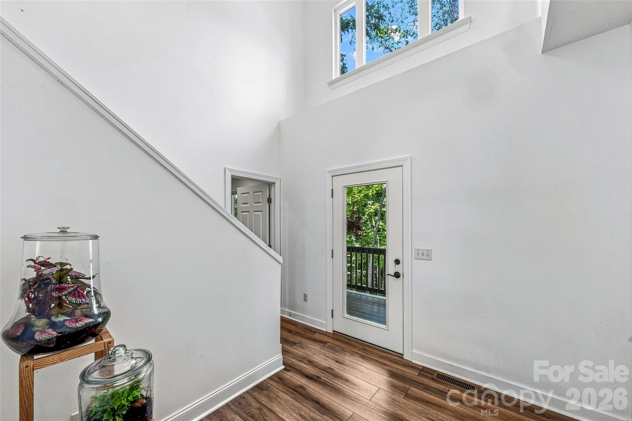 Light-filled entry and staircase - 820 Merrills Cove Road, Asheville