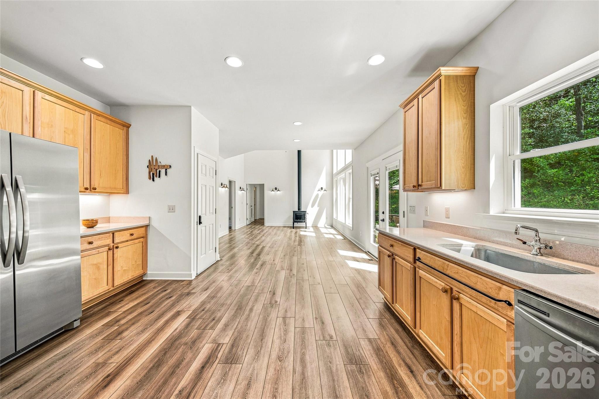Kitchen opens to main living areas - 820 Merrills Cove Road, Asheville