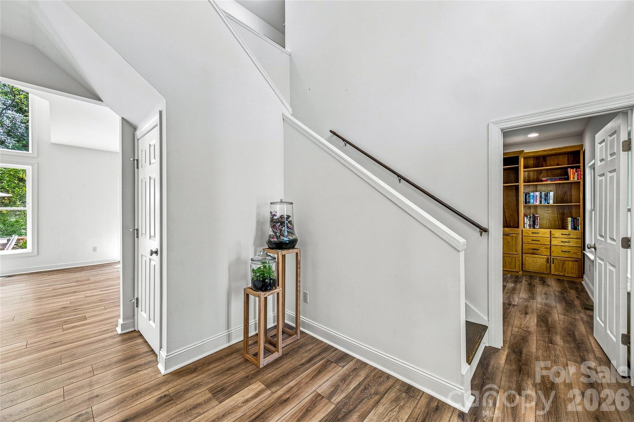 Main-level hallway and staircase - 820 Merrills Cove Road, Asheville