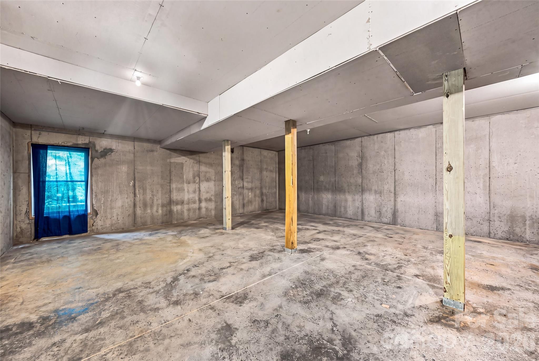 Basement offers excellent expansion potential - 820 Merrills Cove Road, Asheville