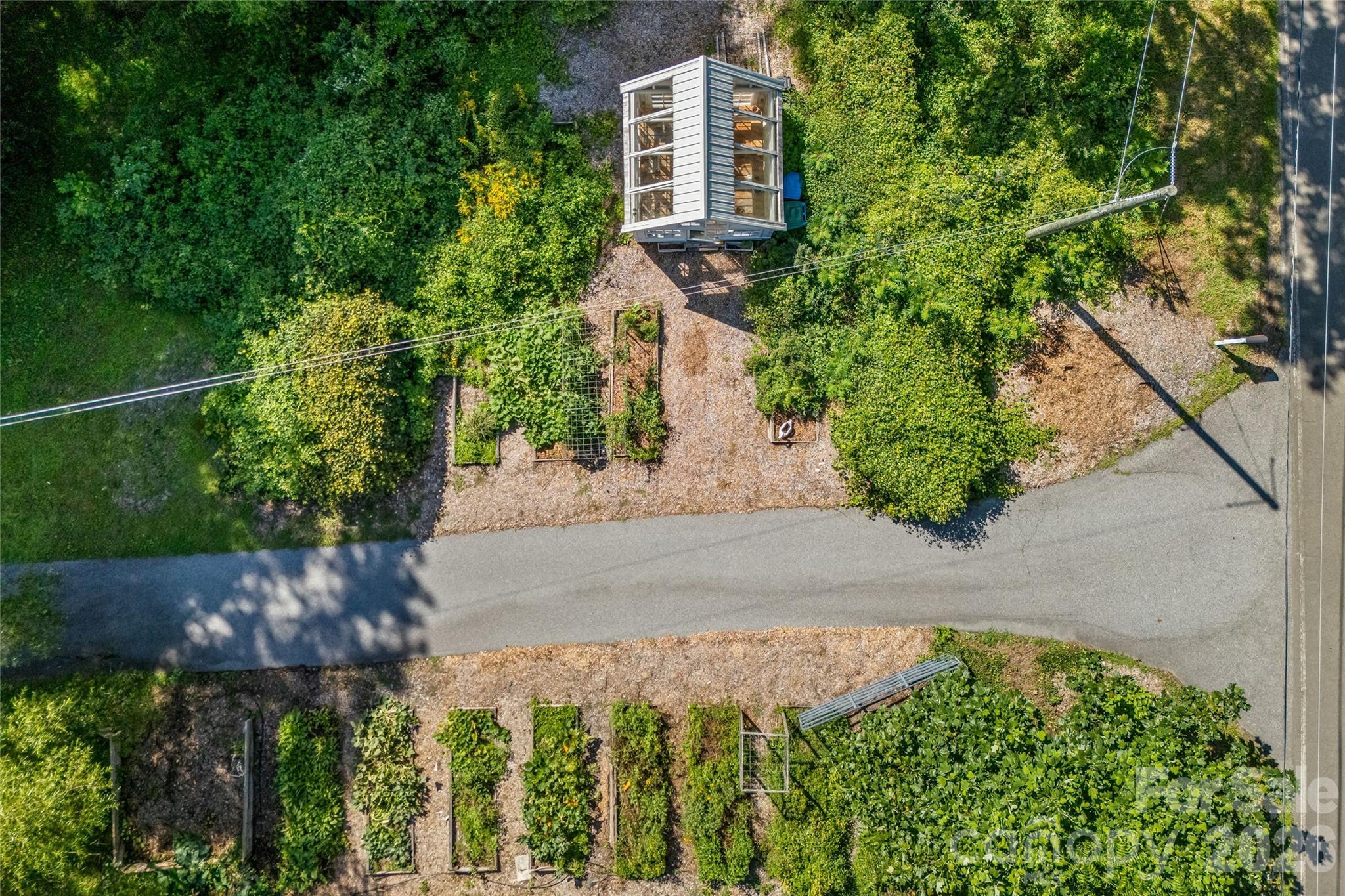 Aerial view of gardens and greenhouse - 820 Merrills Cove Road, Asheville