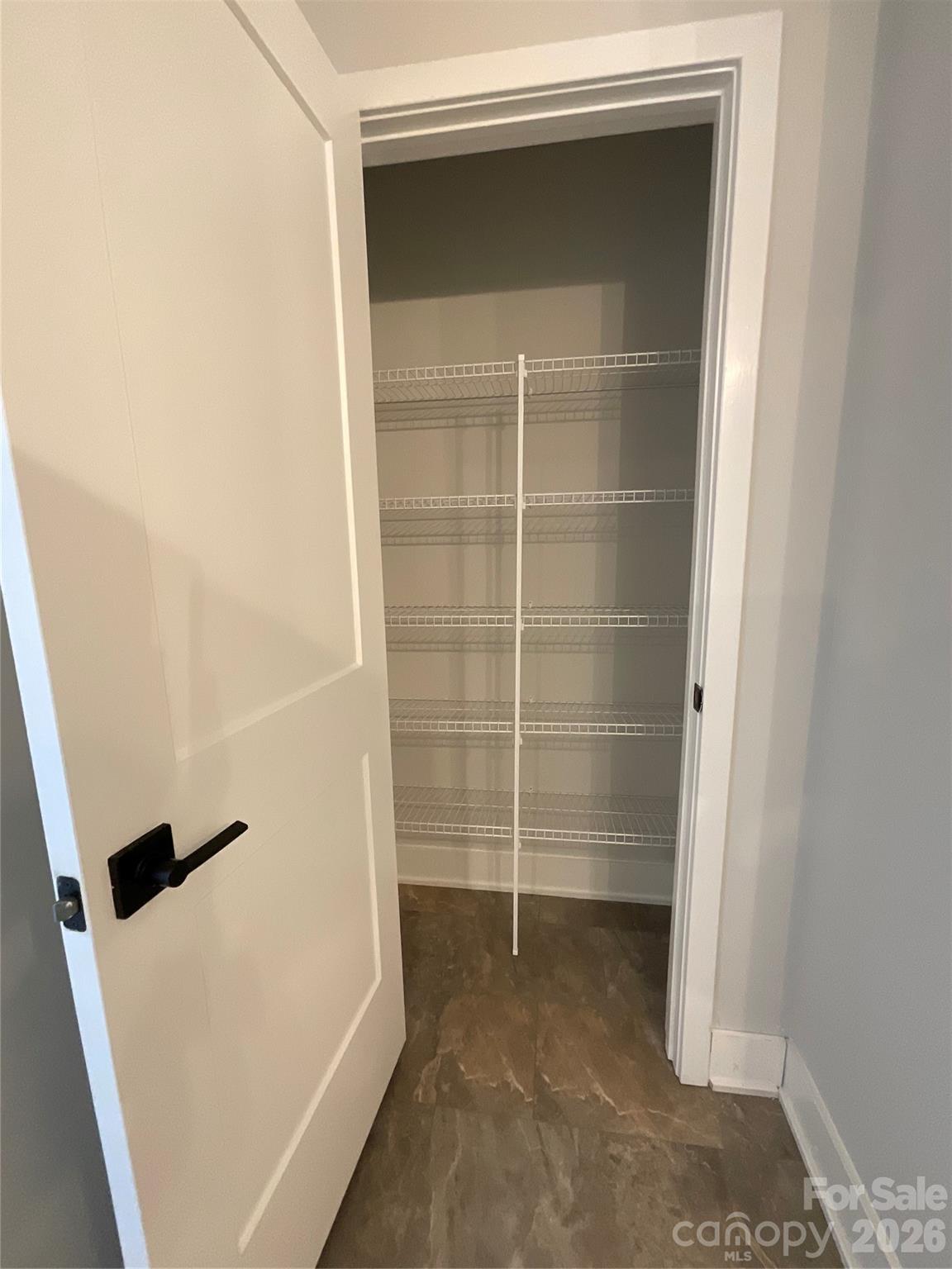 Linen Closet in Primary Bathroom - 156 Kerr Walk Drive, Statesville