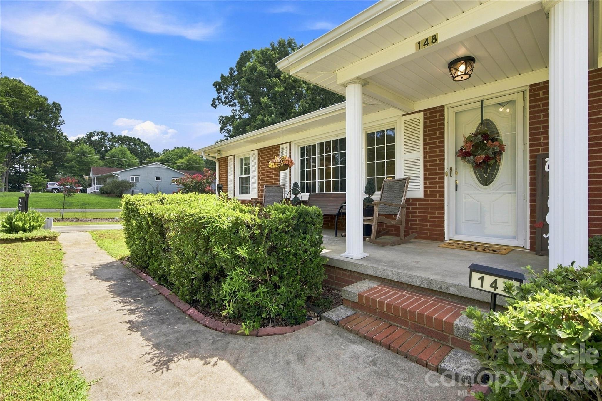 Friendly rocking chair front porch. - 148 Era Street, Troutman