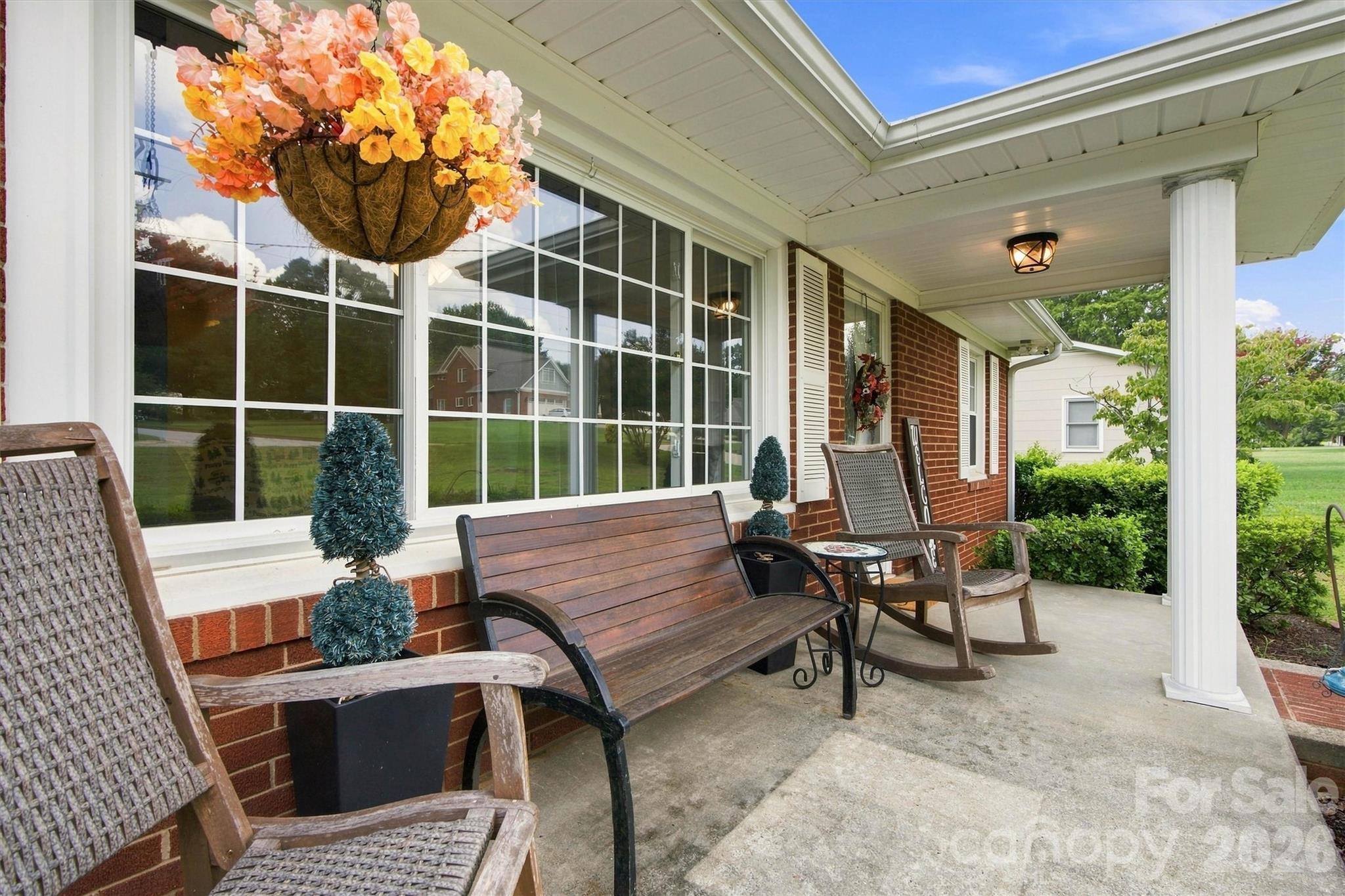 Rocking chair front porch is a plus!! - 148 Era Street, Troutman