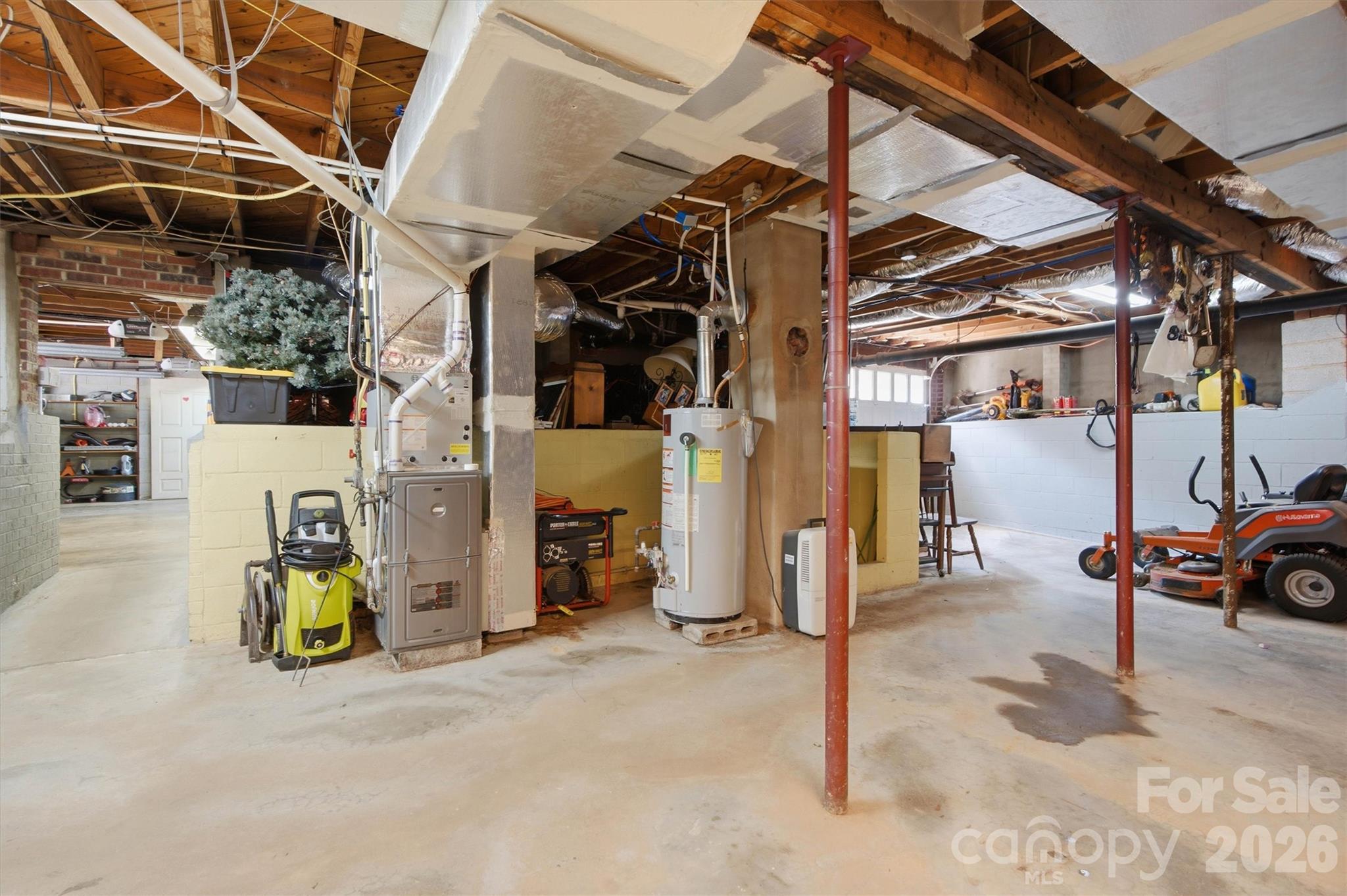 Basement workshop is heated and cooled. - 148 Era Street, Troutman
