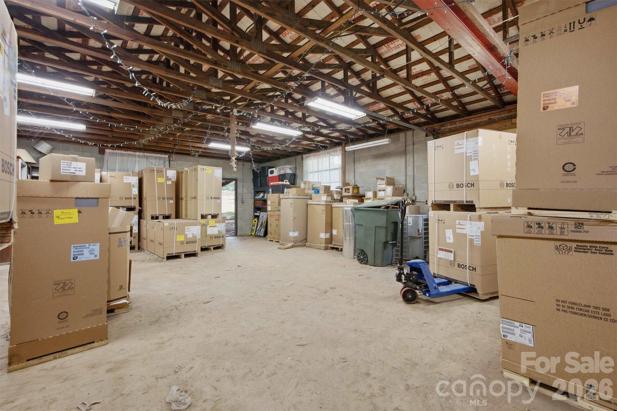 All outbuildings with electrical power. Tons of storage area. - 148 Era Street, Troutman