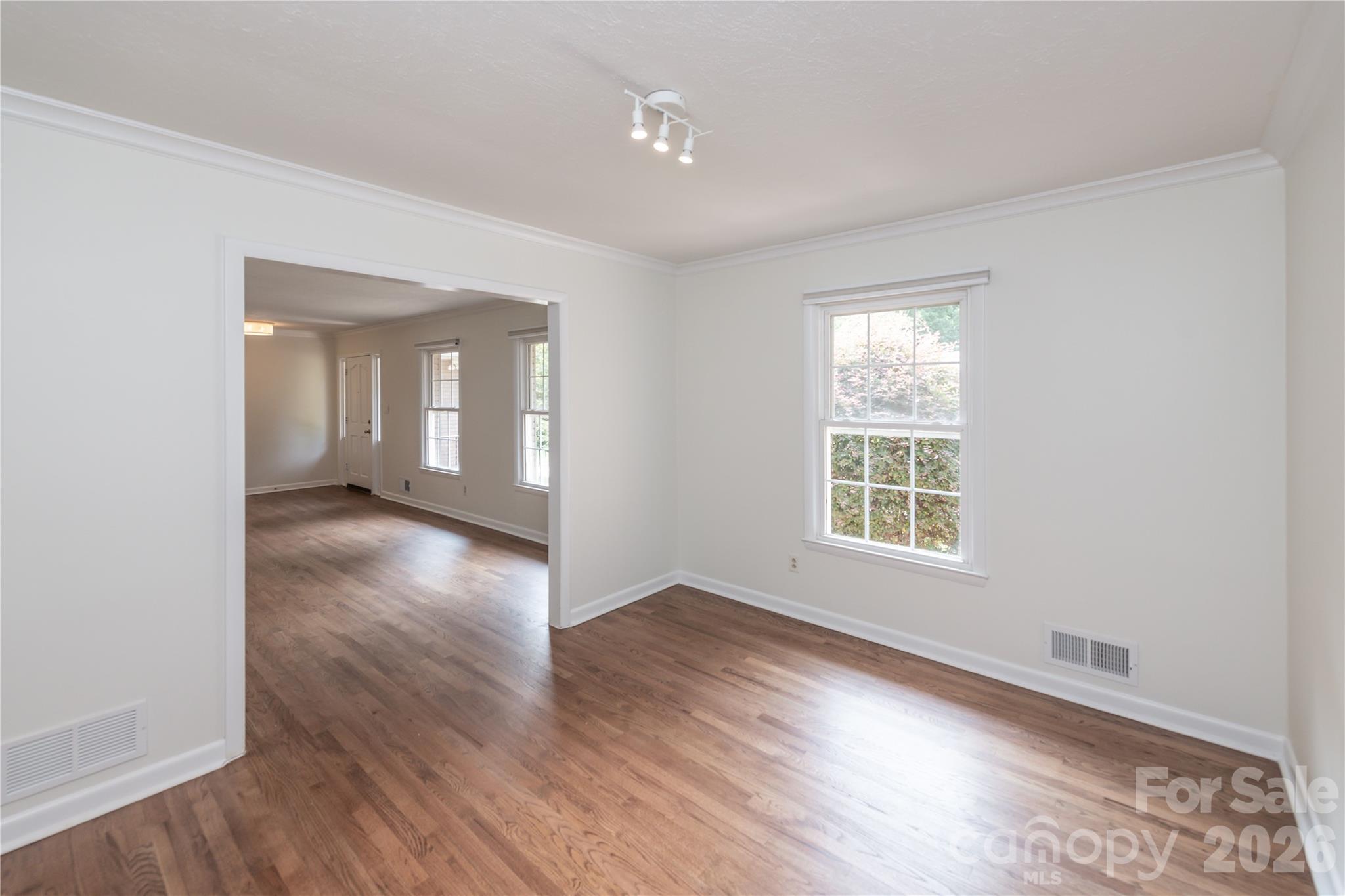 View from dining room into the den - 171 Suburban Avenue NE, Concord