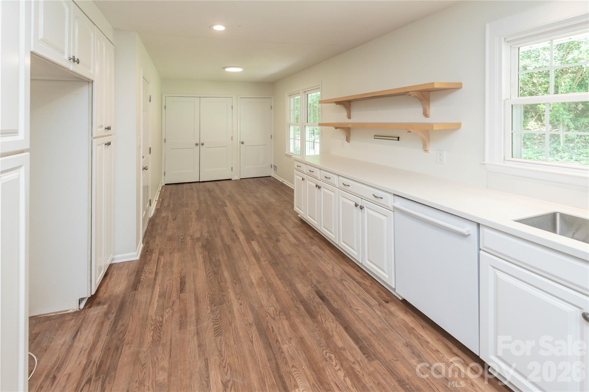 Large kitchen with tons of storage options and great natural light - 171 Suburban Avenue NE, Concord