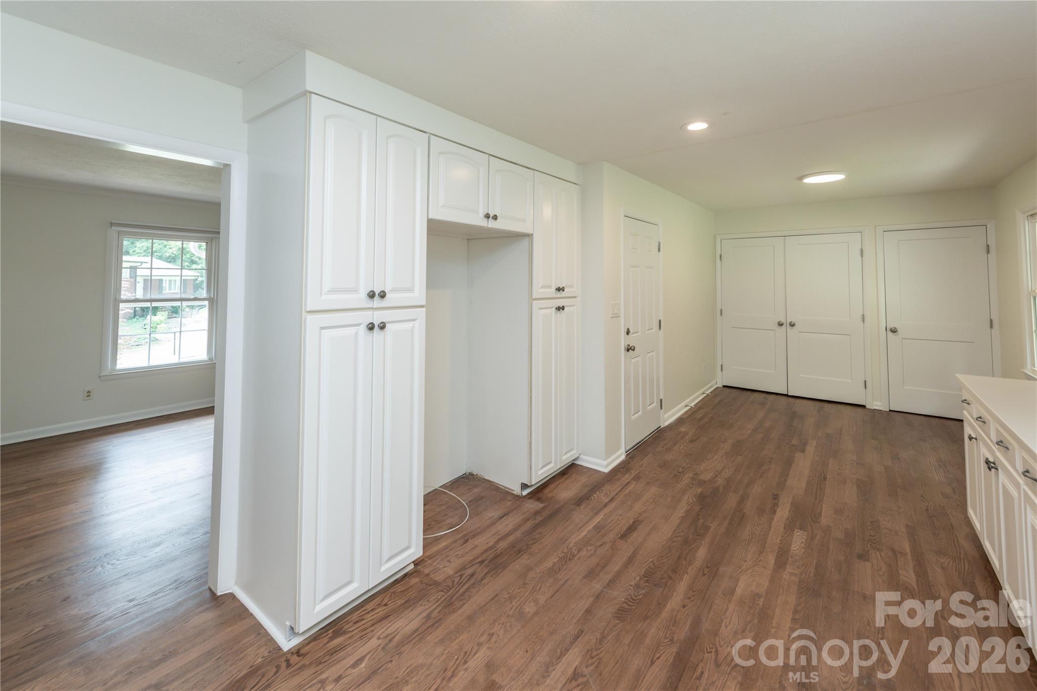 View from kitchen into the dining room - 171 Suburban Avenue NE, Concord