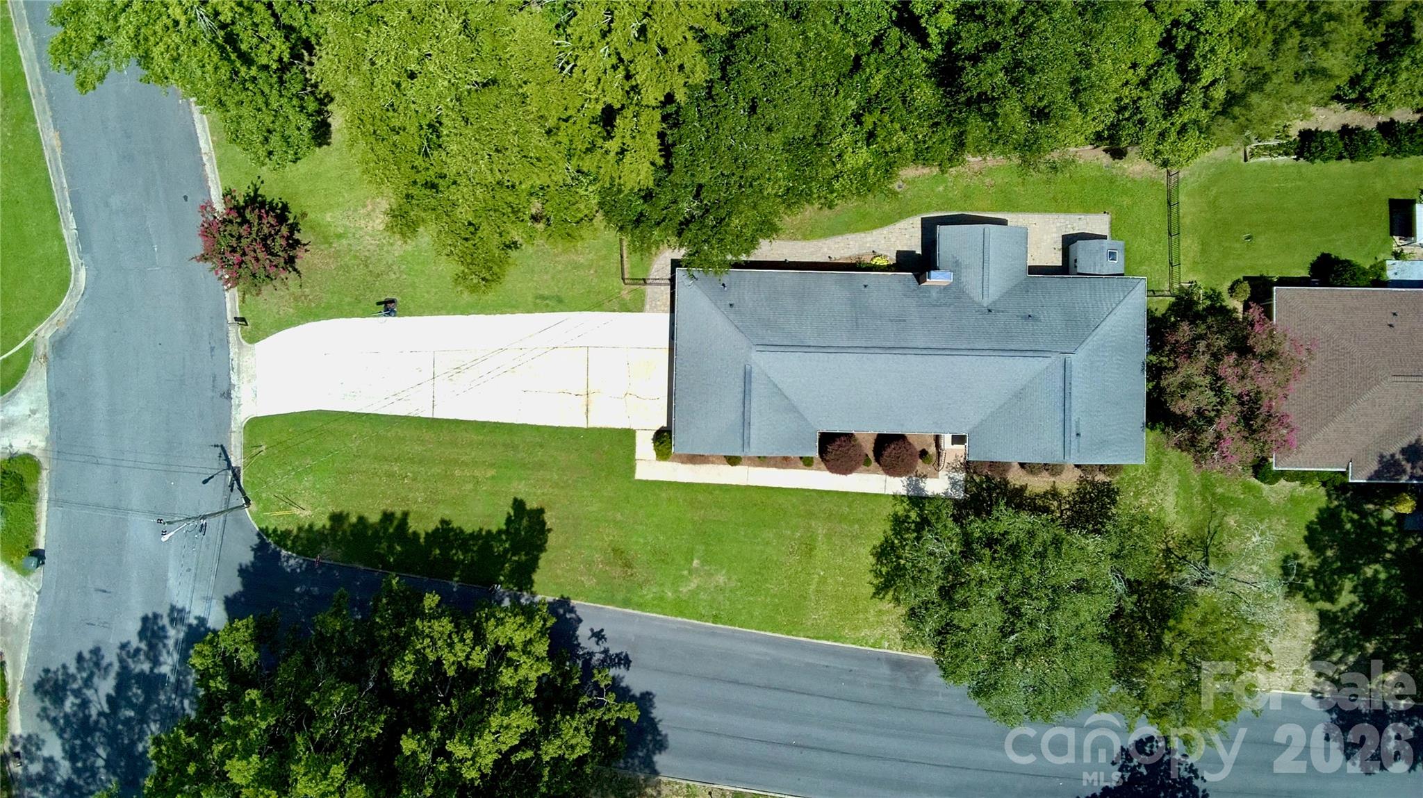 Large corner lot with extended driveway and walking distance to Atrium Hospital and more. - 171 Suburban Avenue NE, Concord