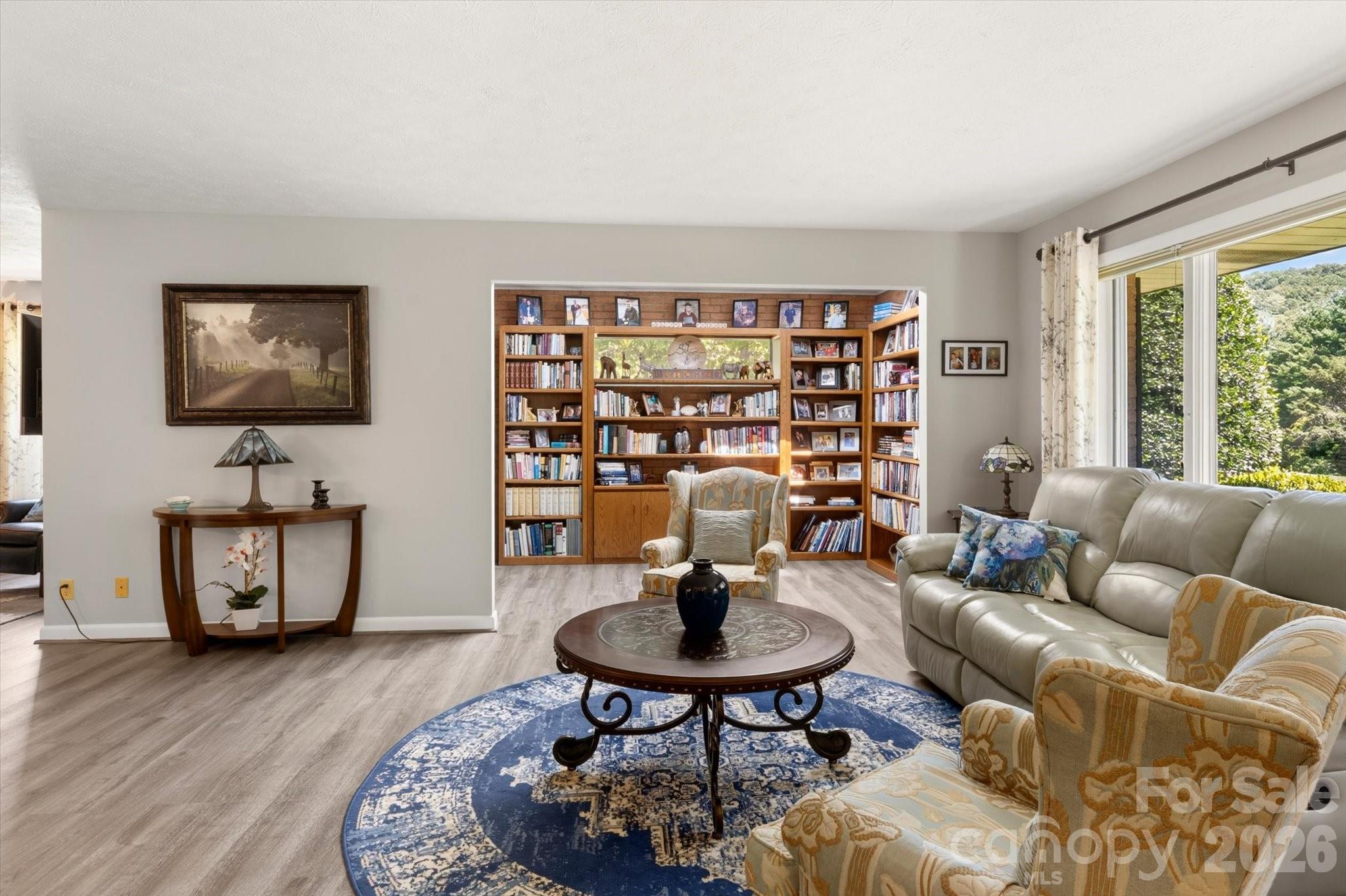 Living room with library nook - 12 Highlander Lane, Hendersonville