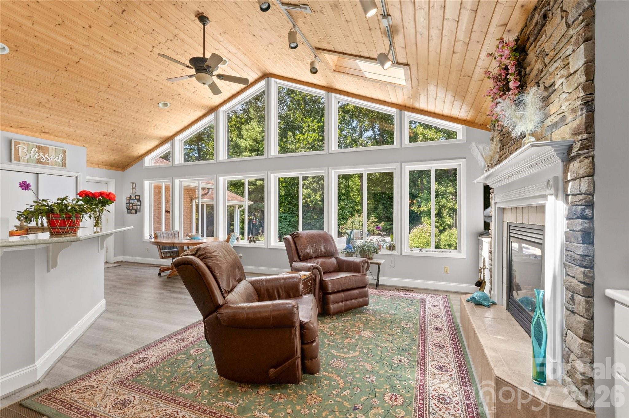 Wall of windows overlooking backyard - 12 Highlander Lane, Hendersonville