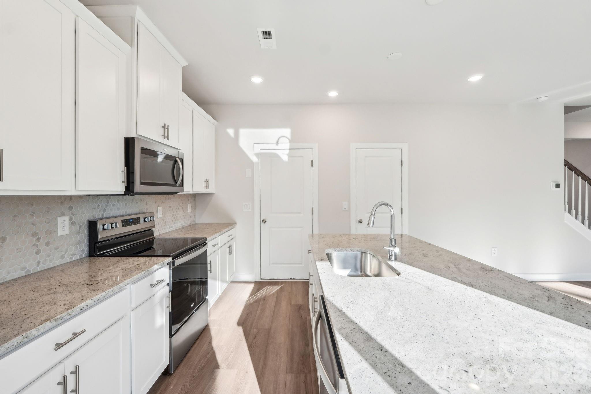 Photo is not of the actual home, but is an inspirational photo of builder’s model home and may depict options, furnishings, and/or decorator features that are not included - 5065 Poplin Valley, Cherryville