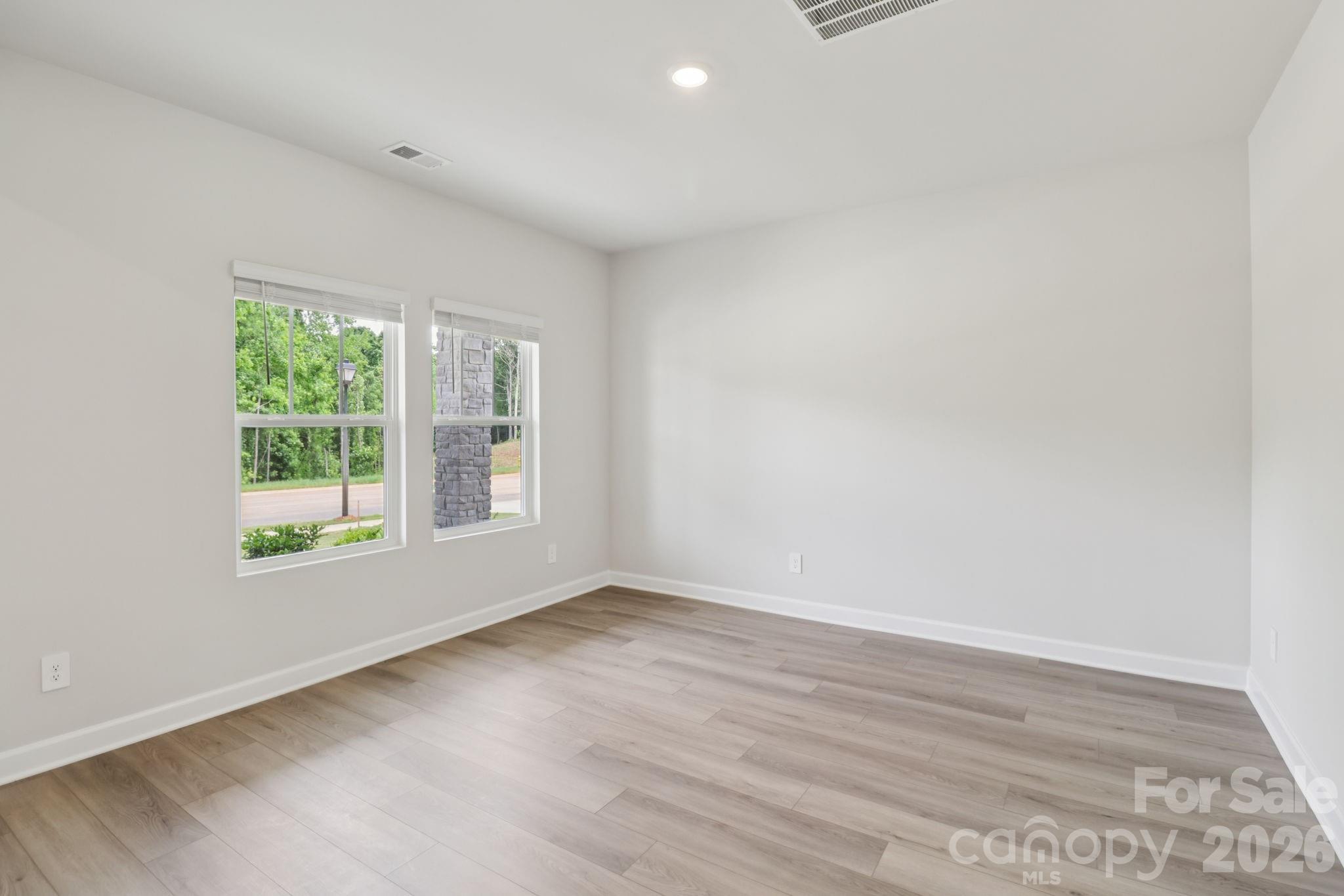 Photo is not of the actual home but is an inspirational photo of builder’s model home and may depict options, furnishings, and/or decorator features that are not included. - 2310 Snapdragon Court, Stanley
