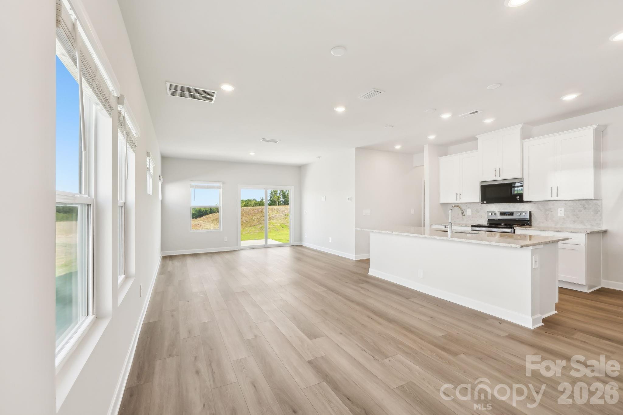 Photo is not of the actual home, but is an inspirational photo of builder’s model home and may depict options, furnishings, and/or decorator features that are not included - 3079 14th Avenue NE, Conover