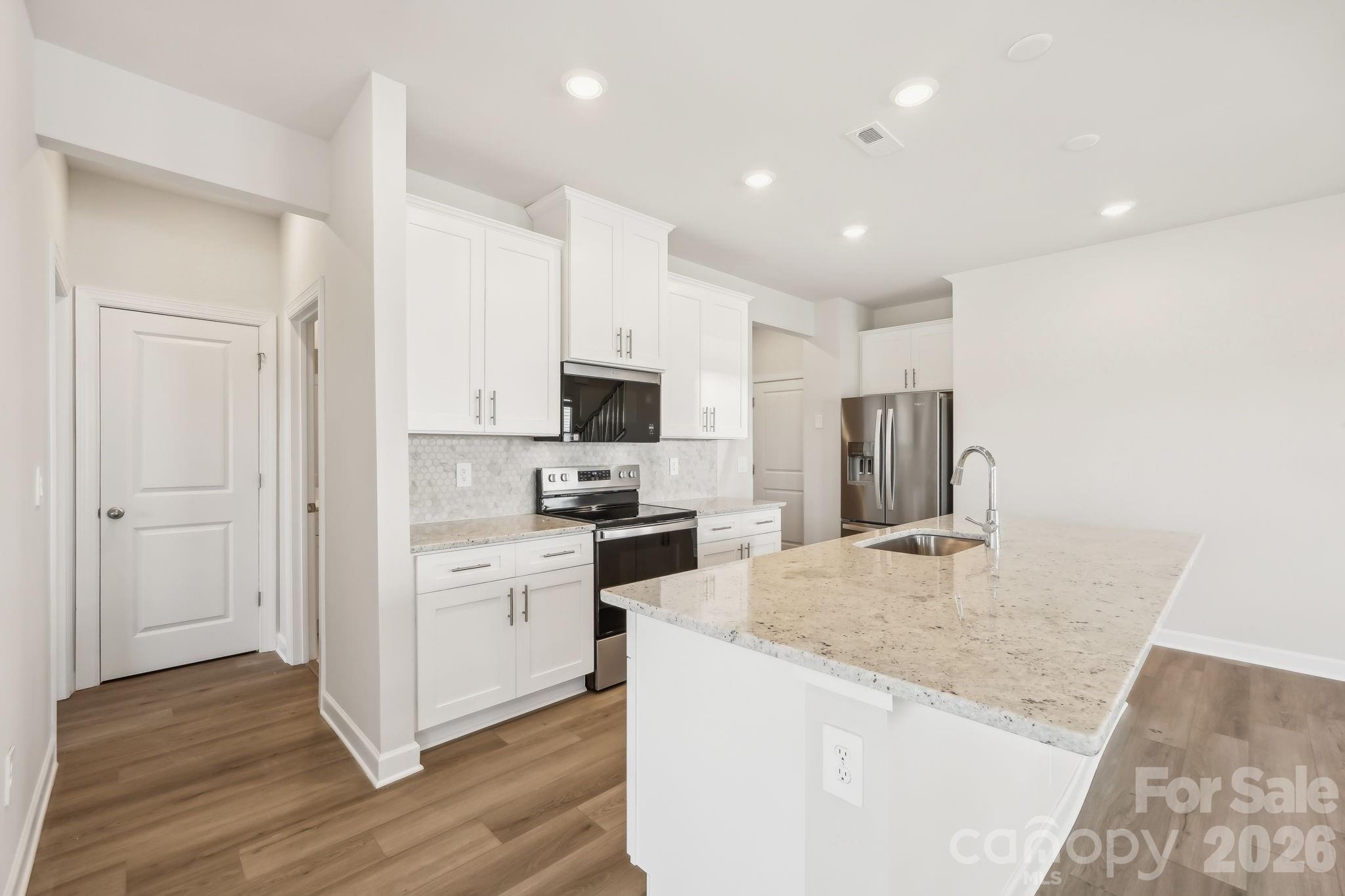 Photo is not of the actual home, but is an inspirational photo of builder’s model home and may depict options, furnishings, and/or decorator features that are not included - 3079 14th Avenue NE, Conover