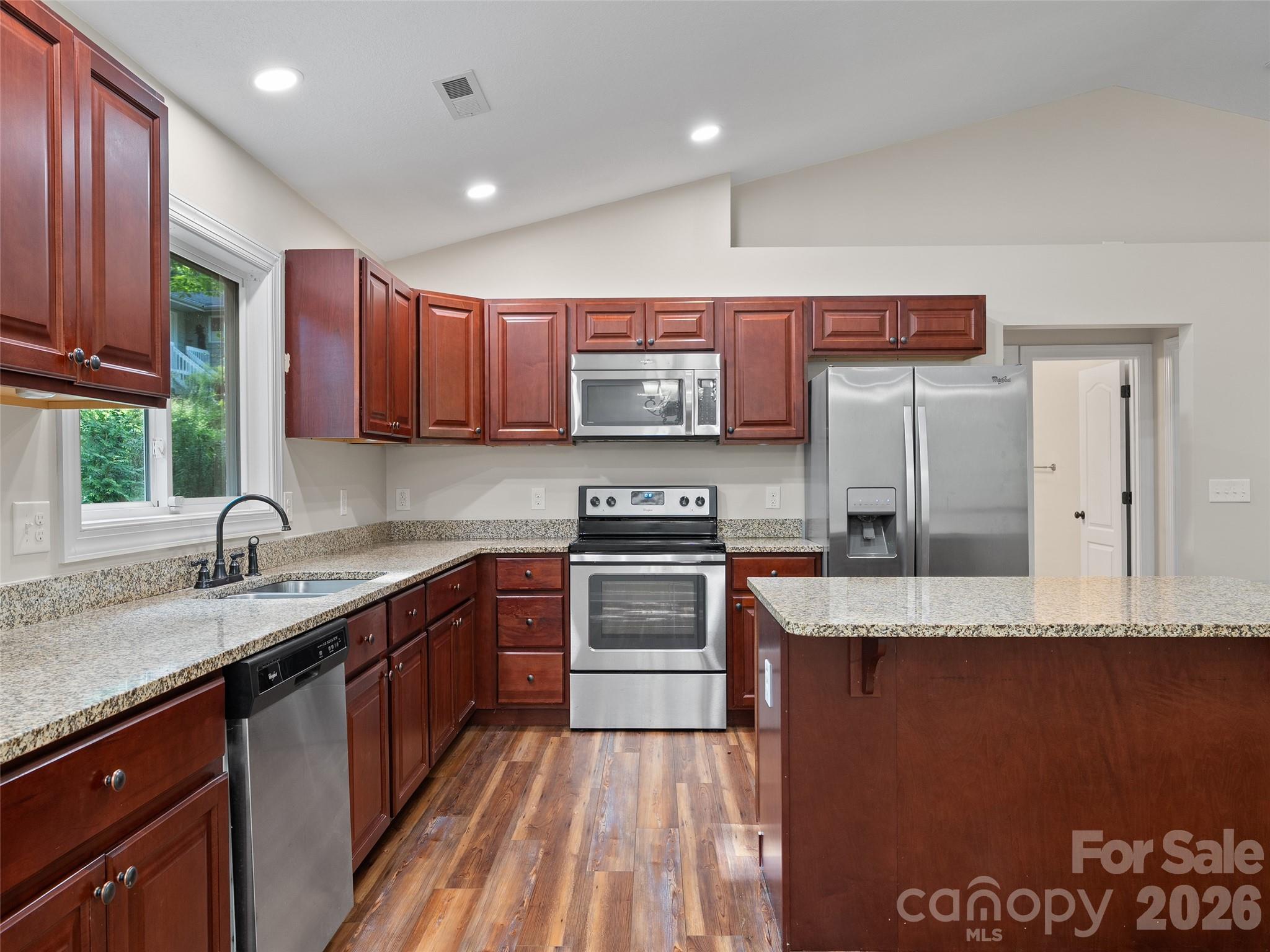 Open Kitchen with Large Island and Stainless Appliances - 11 Tahchee Trail, Fletcher